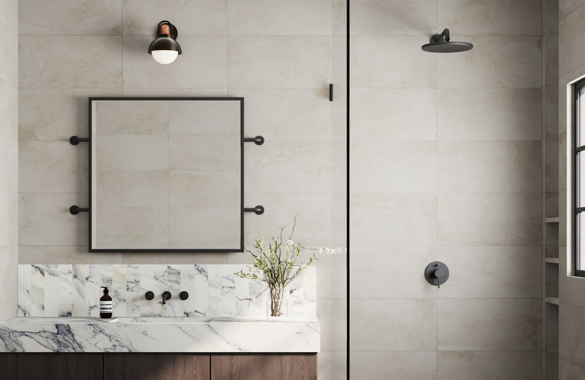 Large-format light shower tiles with minimal grout lines create a seamless, open look that enhances perceived space.