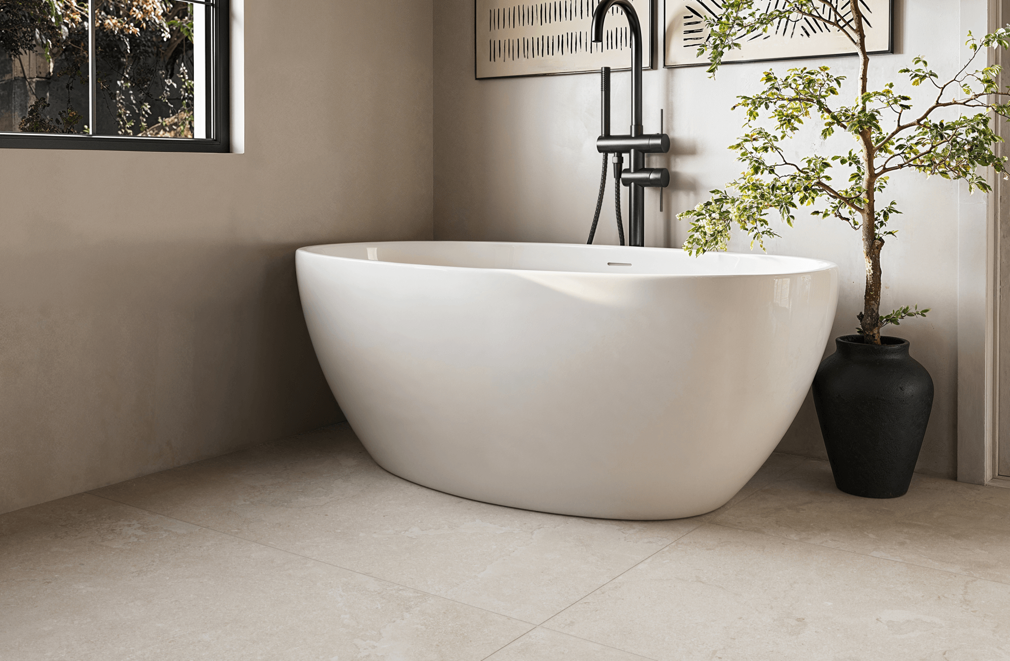 null Warm beige stone-look bathroom floor surrounding a modern soaking tub and an indoor plant adds gentle depth while maintaining a light, calming atmosphere.