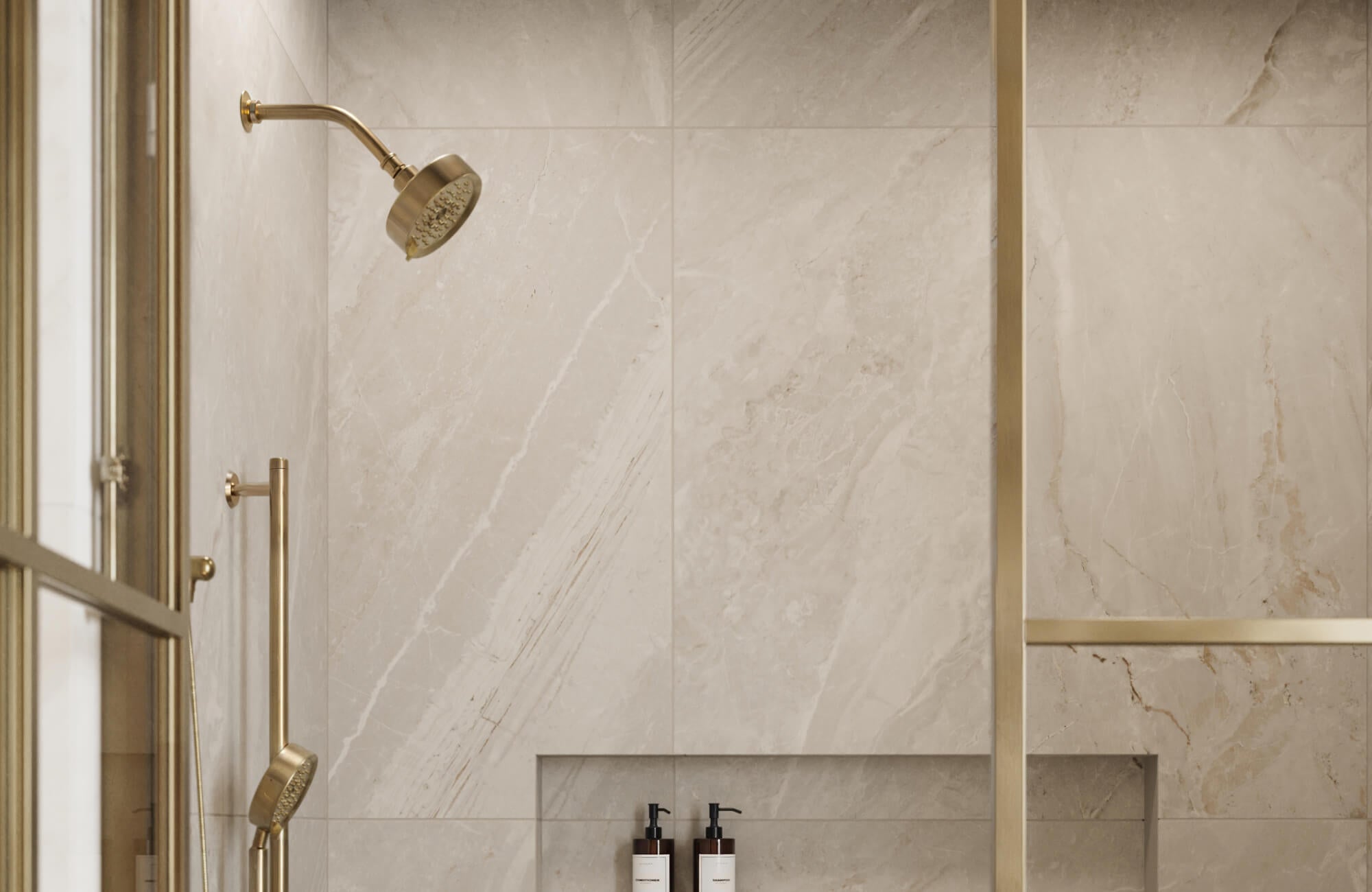 null Soft cream marble-look tiles laid horizontally across the shower walls, combined with warm brass accents, create a bright, open mood that expands the room’s width.
