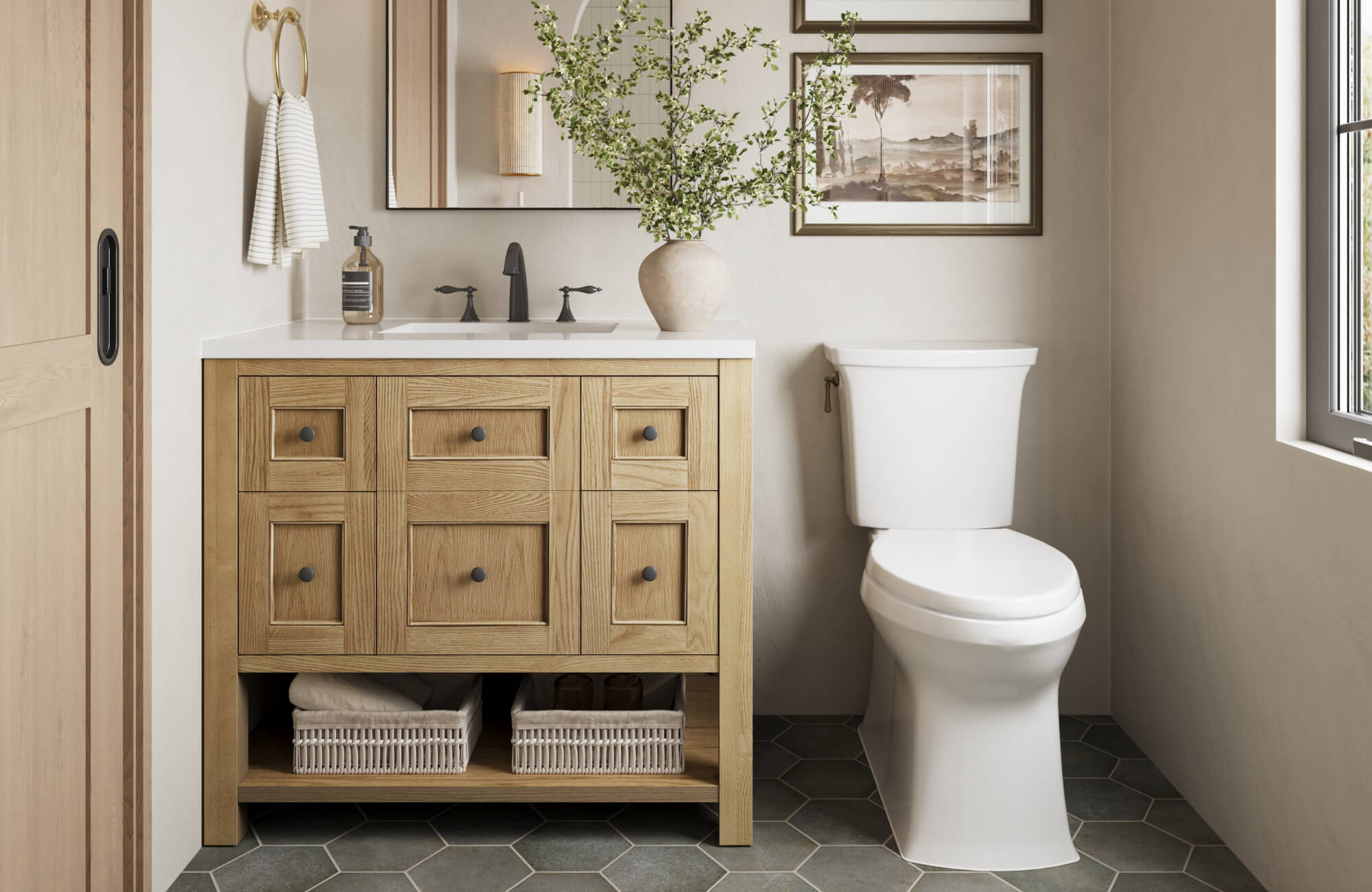 null Compact wood vanity anchoring a bright bathroom scene, coordinating with soft wall tones, framed artwork, and natural accents for a calm, well-composed look.