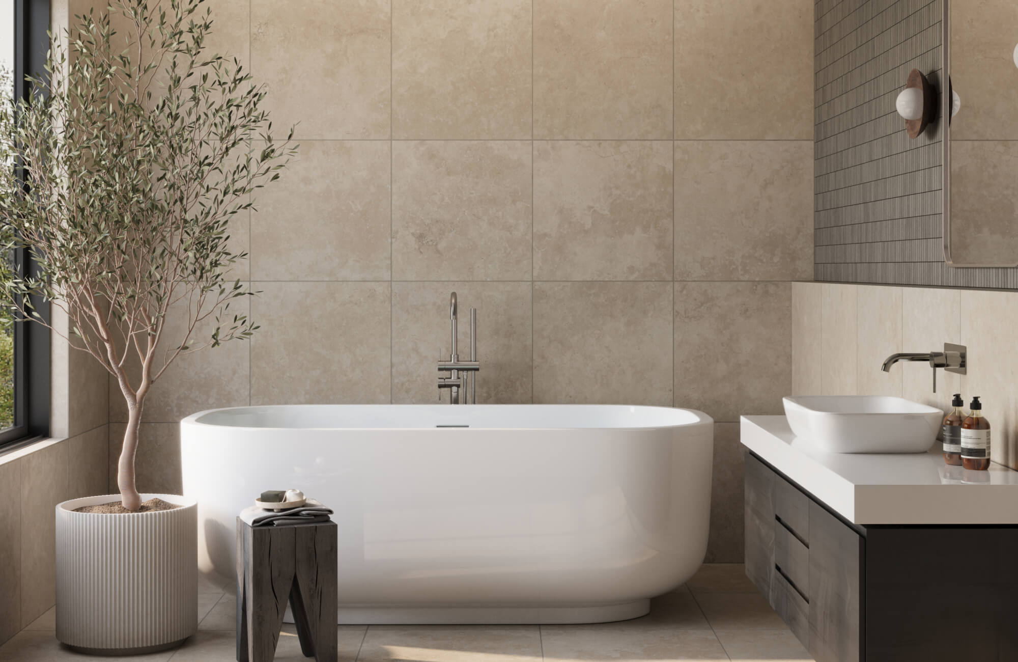 null Modern bathroom with large-format beige tiles across the floor and full-height bathtub wall, paired with a white freestanding tub and dark vanity.