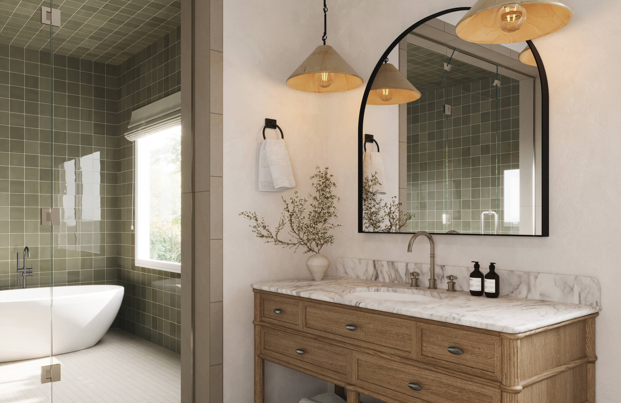 null Warm bathroom design featuring a marble-topped vanity, black-framed arch mirror, and cone pendant lighting, with a freestanding tub and green wall tiles nearby.