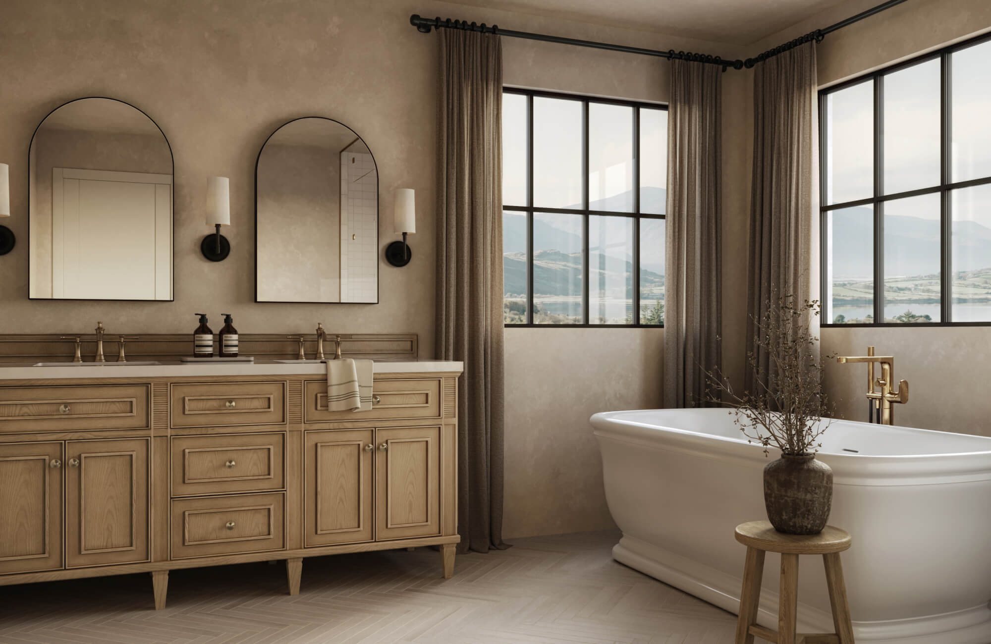 null Light oak double vanity with dual sinks and quartz top, styled with arched mirrors and bronze sconces beside a soaking tub in a scenic, neutral-toned bath.