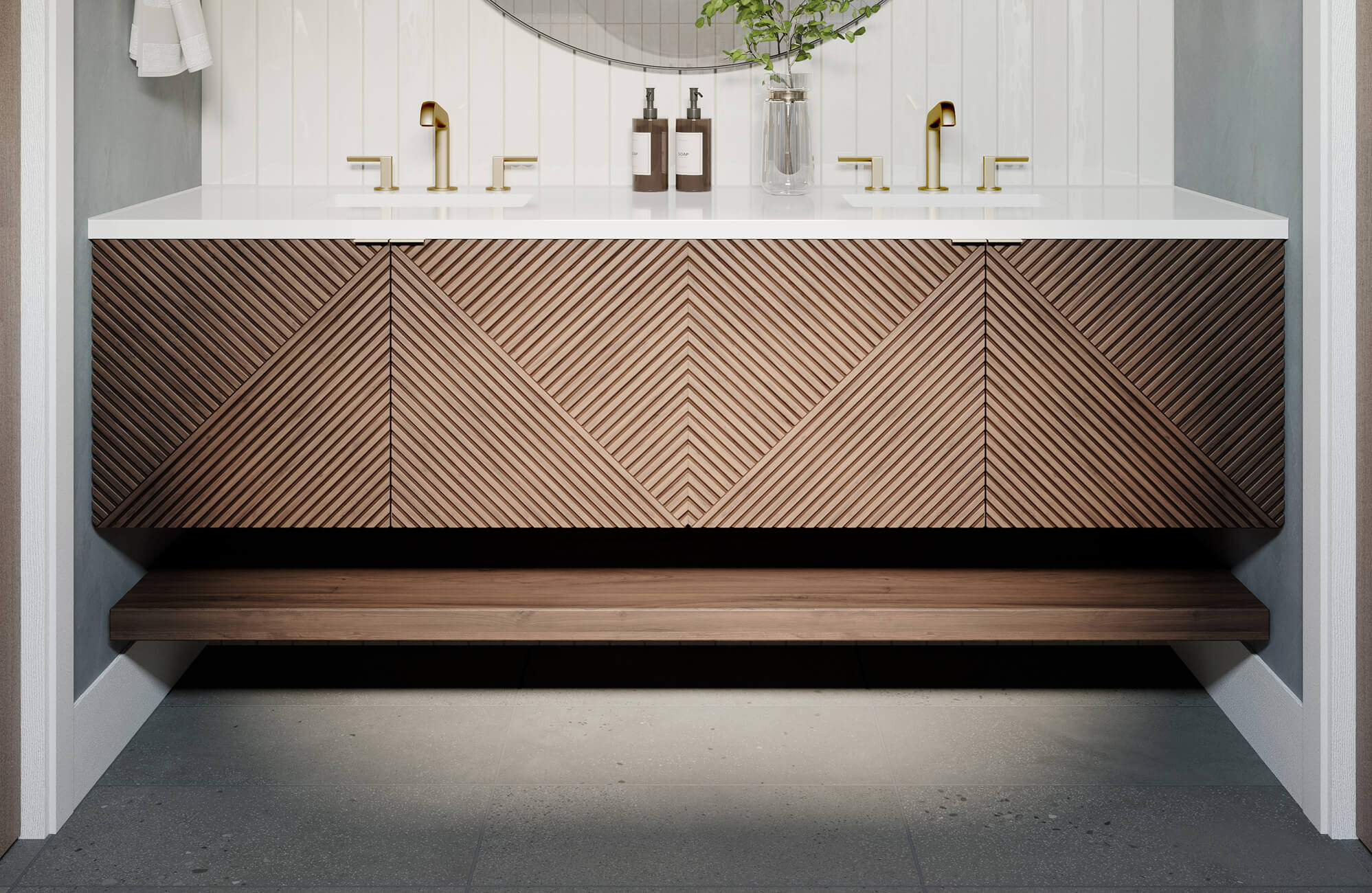 Contemporary bathroom featuring a floating vanity with geometric wood paneling and sleek brass fixtures, complemented by large gray floor tiles that add a grounded, modern elegance to the space.