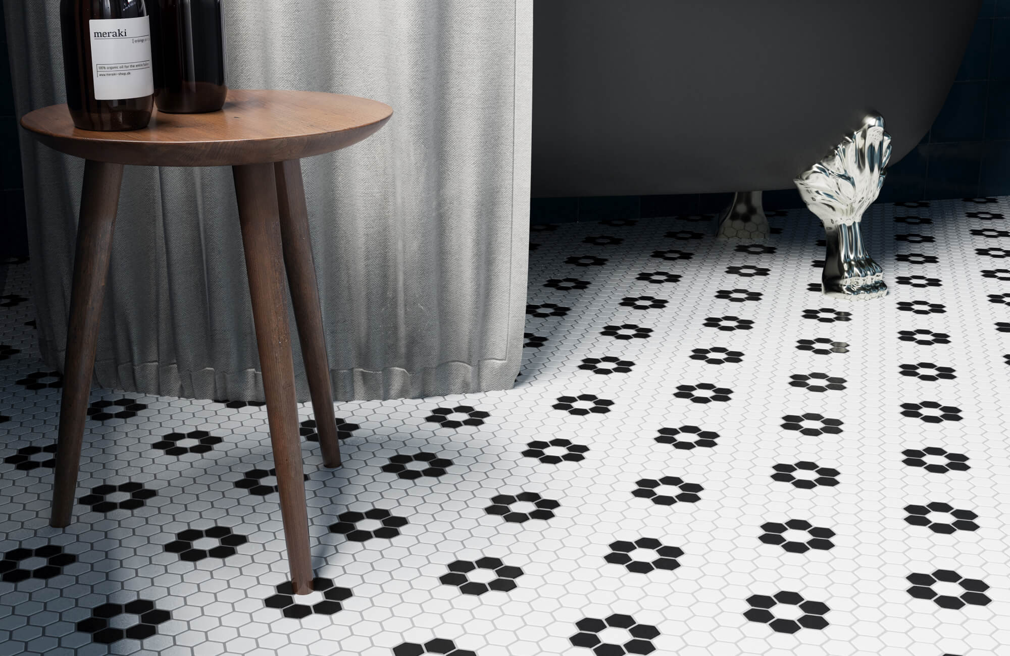 Charming bathroom featuring classic black and white hexagon mosaic floor tiles arranged in a floral pattern, adding vintage-inspired character and timeless elegance to the space.