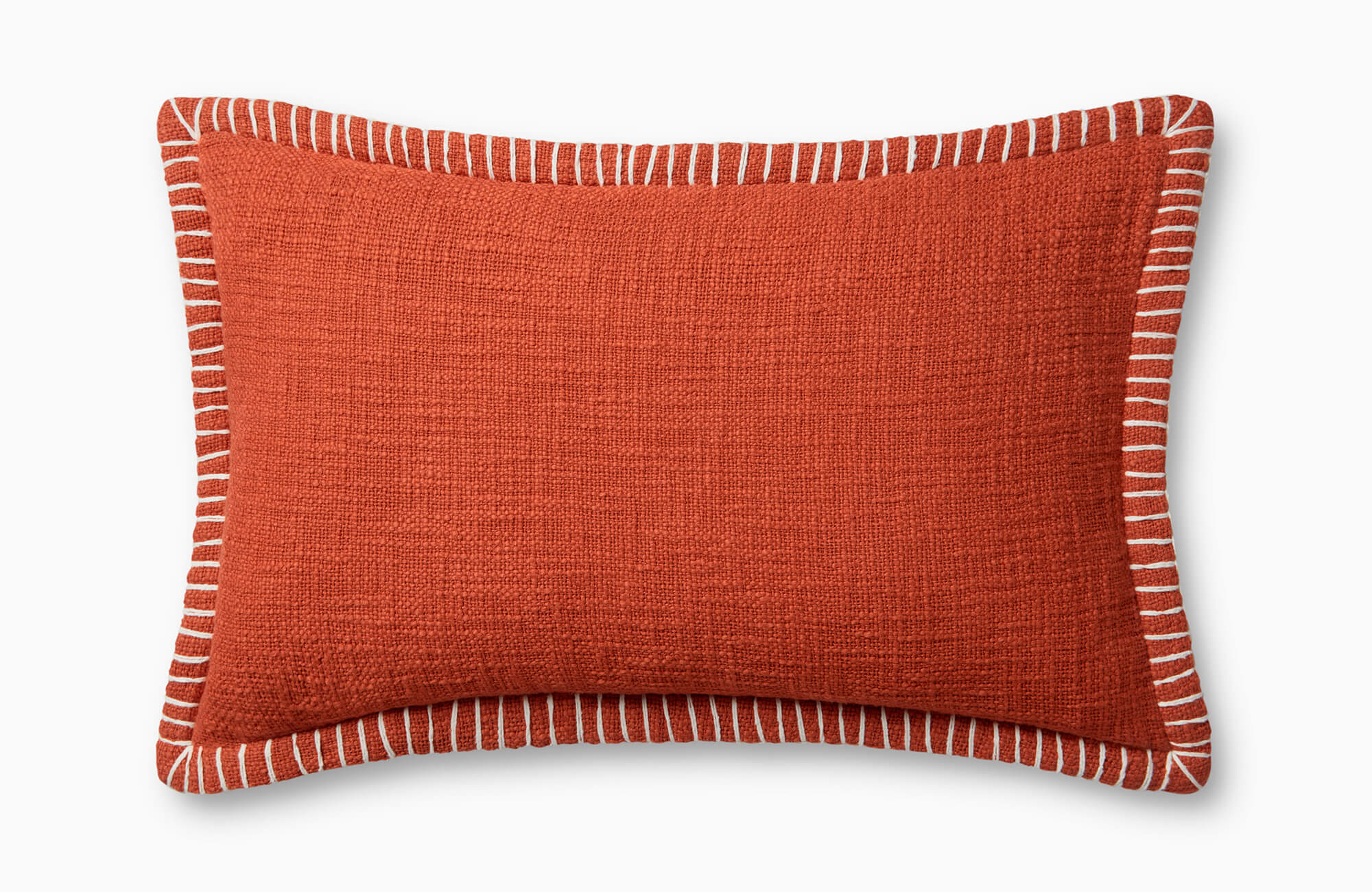 Rust red rectangular throw pillow with woven texture and white stitched border trim on a white background.