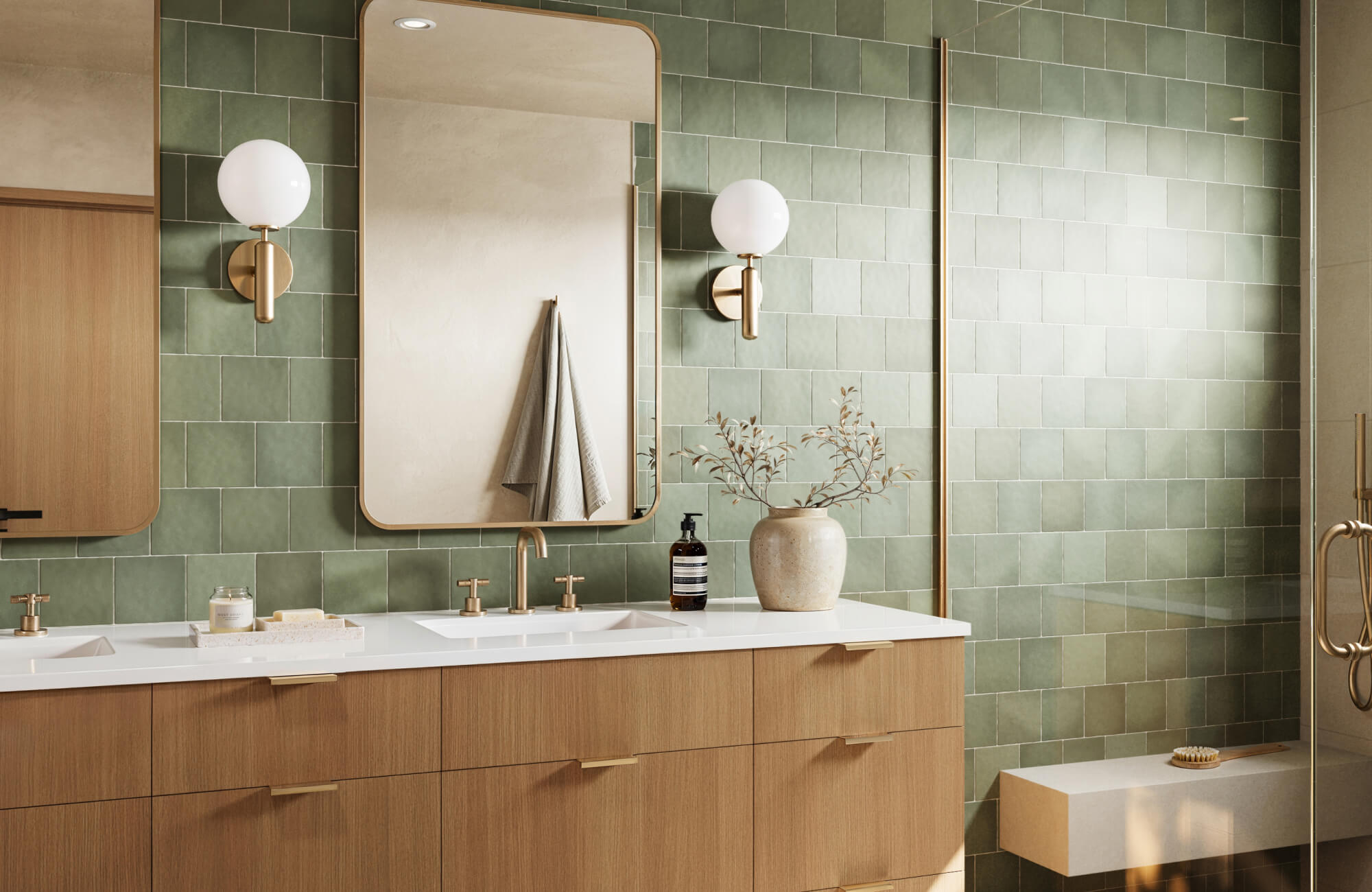 null Modern bathroom with a green Zellige tile backsplash that adds handcrafted texture and glossy depth, paired with light wood cabinetry, brass fixtures, and minimalist décor for a warm, organic elegance.