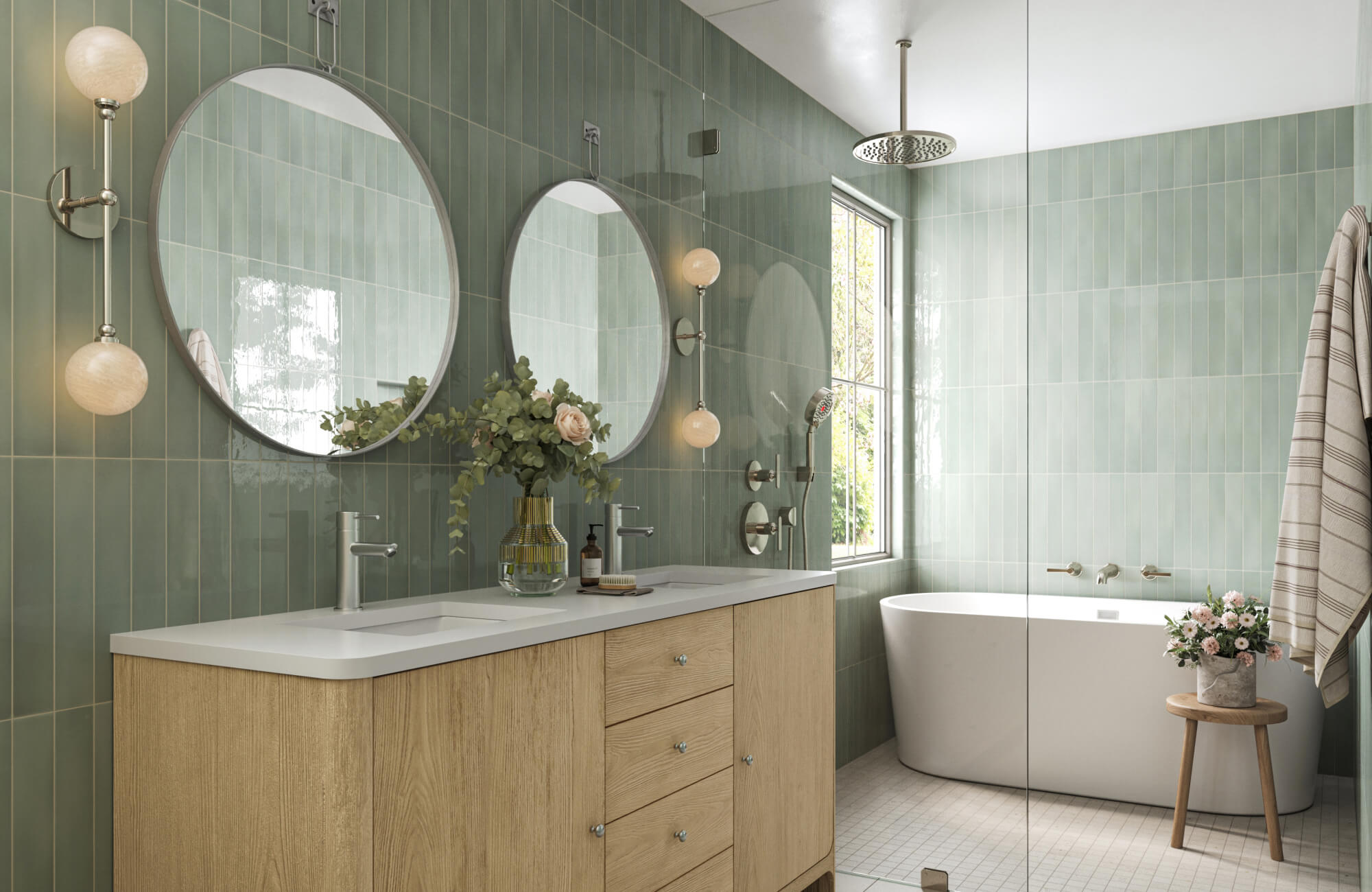 null Spa-like bathroom with sage green vertical tiles, twin round mirrors, freestanding tub, and soft wood vanity with floral accents.