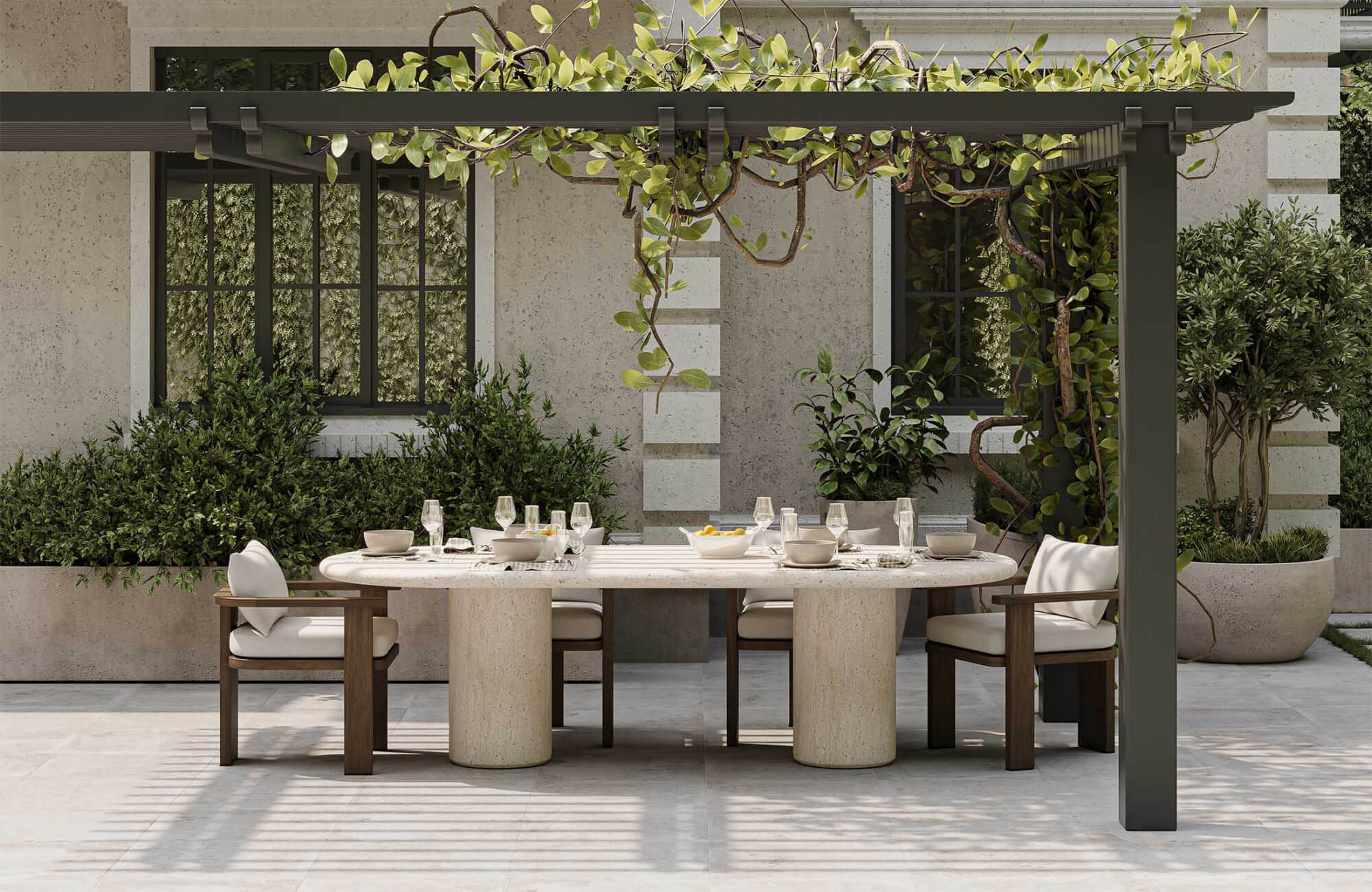 null Pergola-covered outdoor dining area with stone table, cushioned wood chairs, and lush greenery surrounding the patio setting.