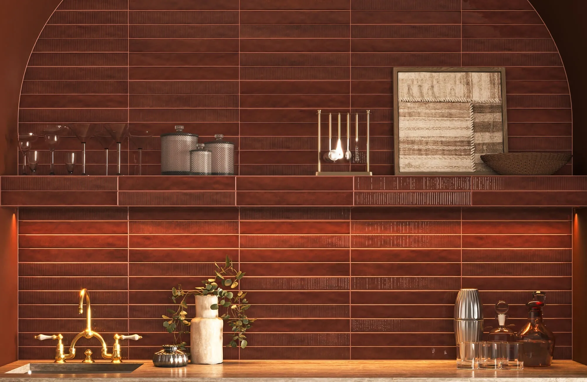 Textured terracotta tile backsplash with framed woven art panel reflects warm, material-driven wall art trend
