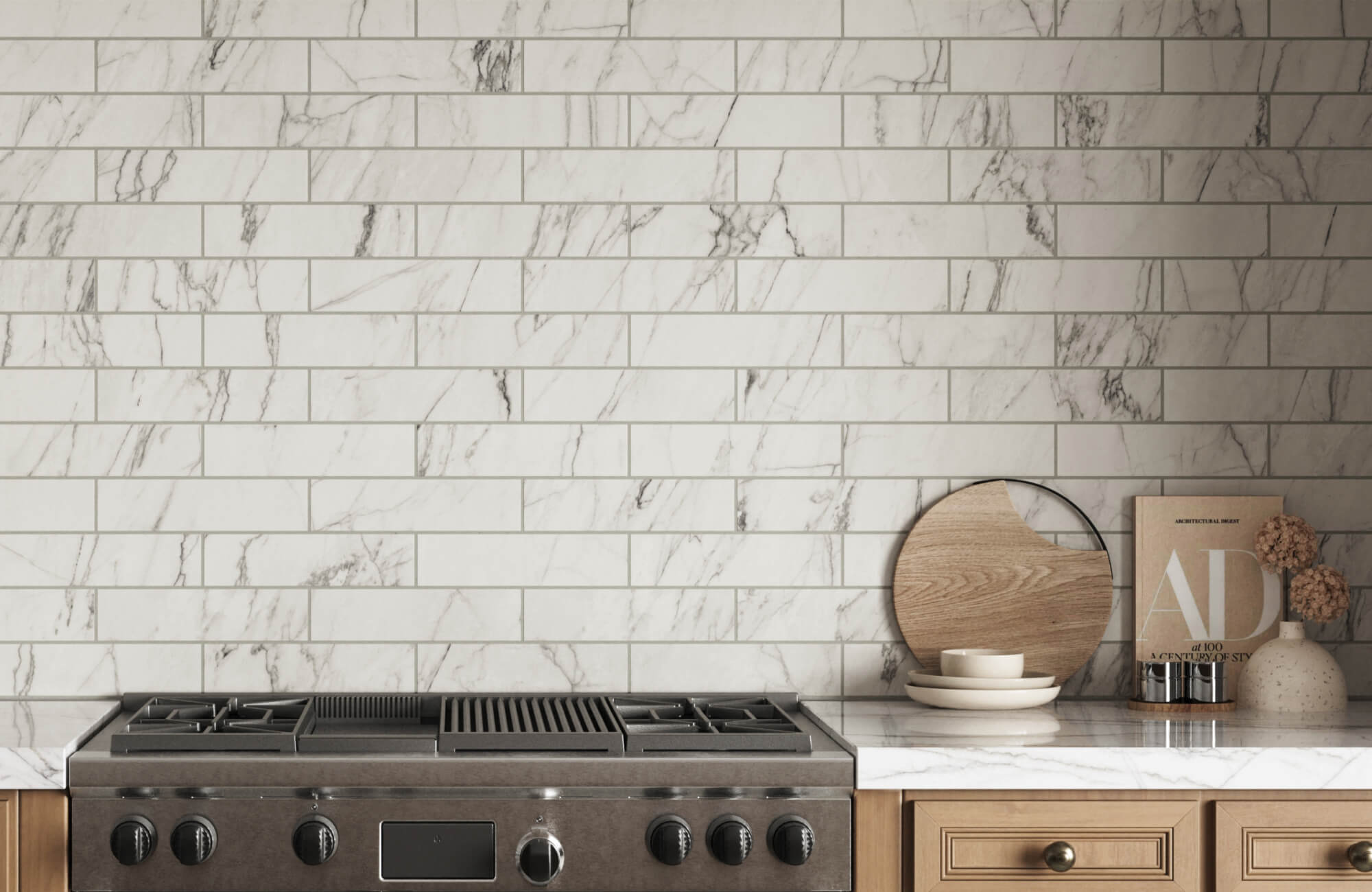 Elegant marble look subway tile backsplash in offset pattern extends across the kitchen wall, adding a timeless touch while pairing beautifully with warm wood cabinetry and sleek stainless steel appliances.