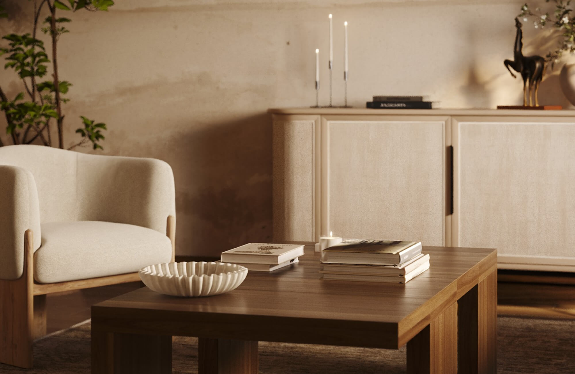 null White fluted decorative bowl on a wooden coffee table in a warm living room with stacked books, a lounge chair, a sideboard, and candle accents.