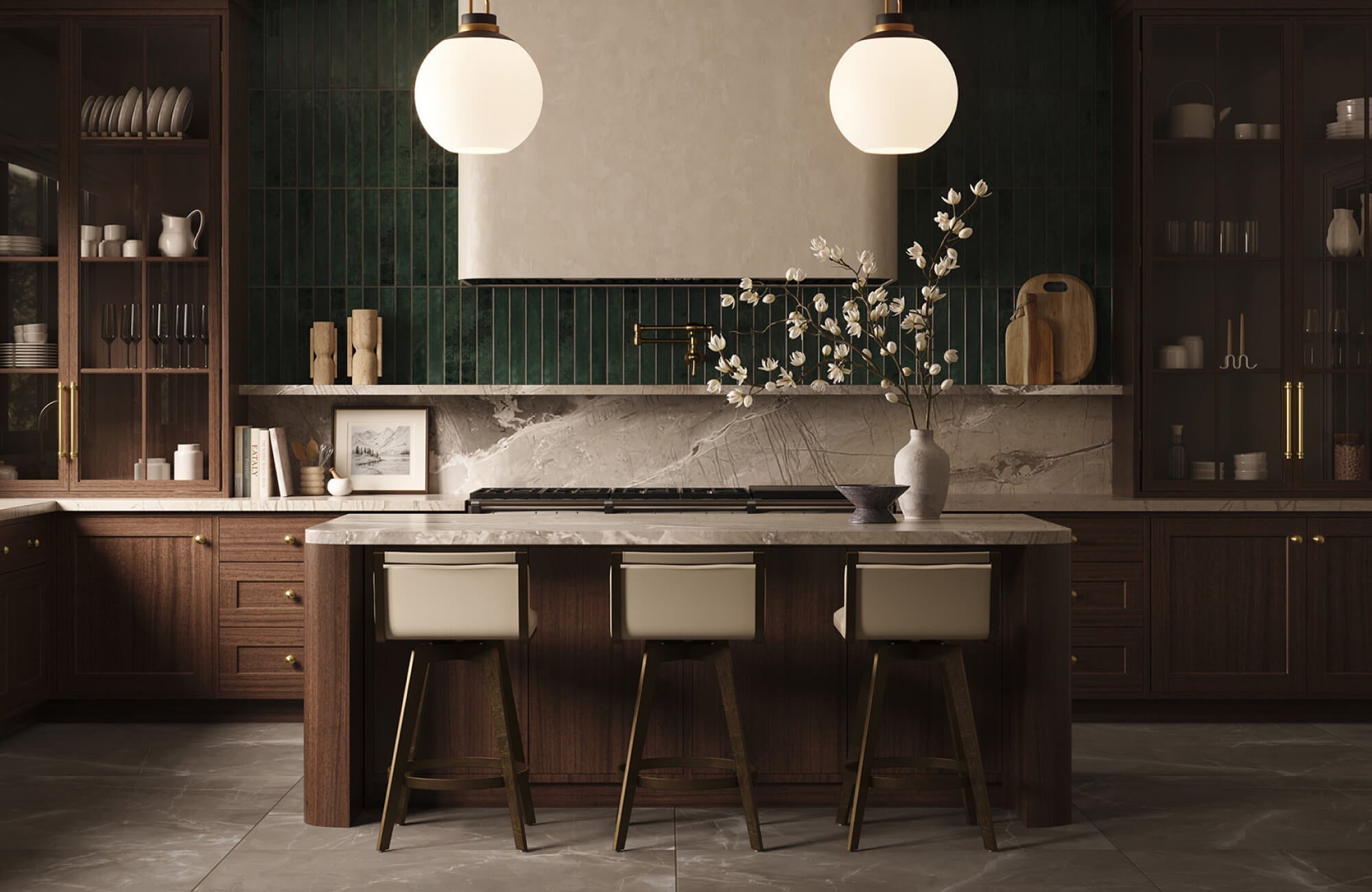 null Dark decorative bowl on a marble kitchen island beside a ceramic vase with white branches, surrounded by dark wood cabinetry and green tile backsplash.