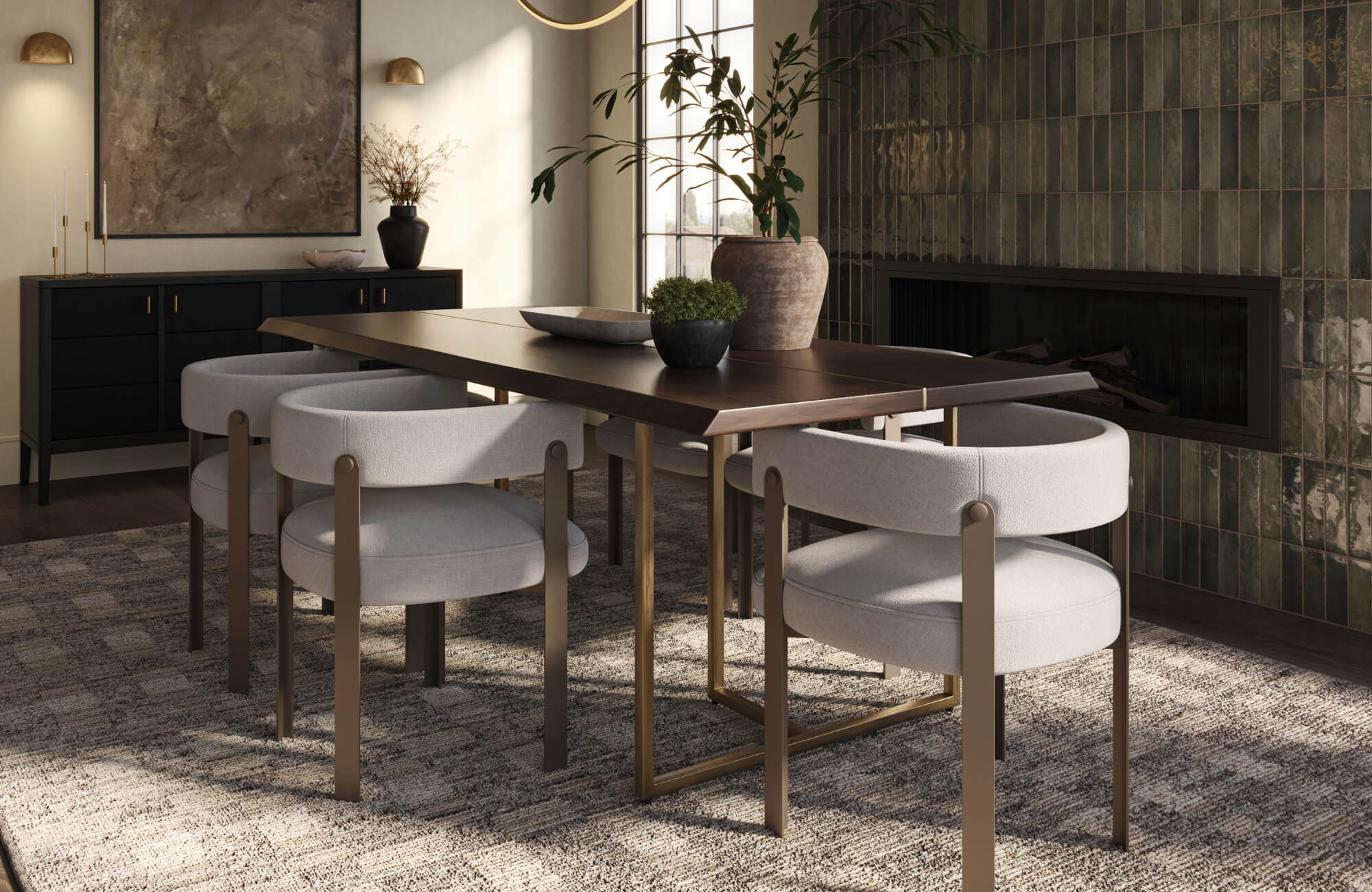 Modern dining room with a dark wood table, sculptural bronze-framed chairs in light upholstery, and a vertical green tile fireplace backdrop.