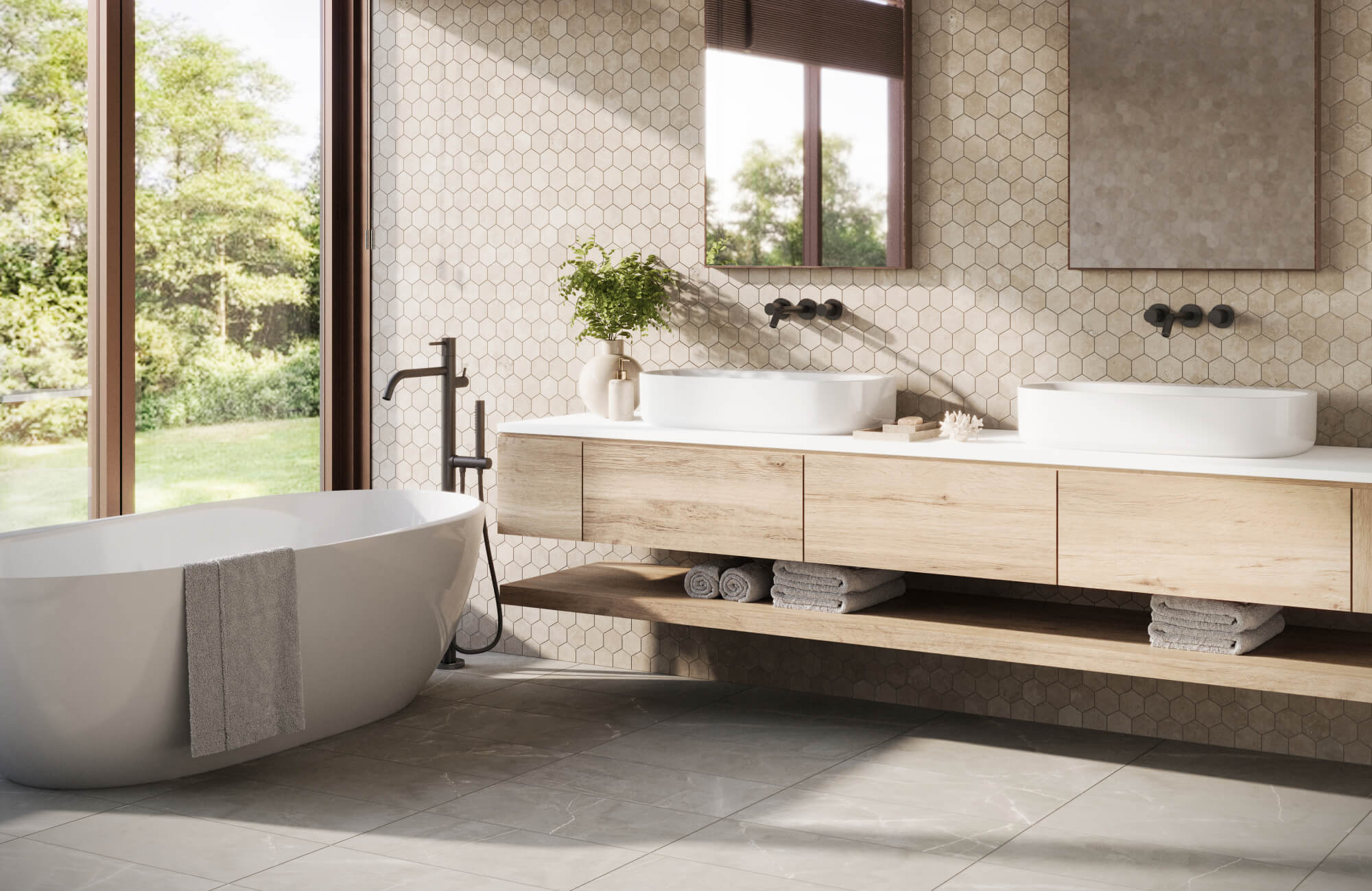 null Modern bathroom with beige hexagon wall tiles and grey floor tiles, featuring a double-sink wood vanity and a freestanding tub.