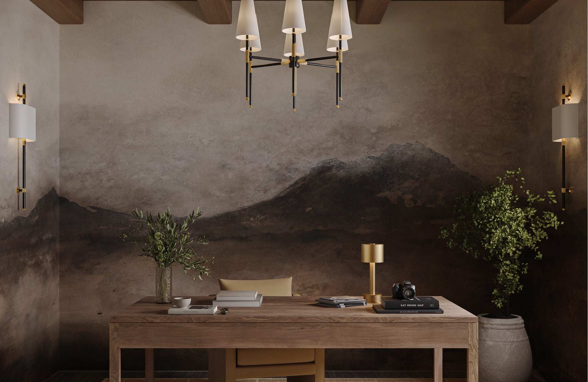 Modern home office with scenic mural wall, wood desk, chandelier, brass accents, and indoor greenery.