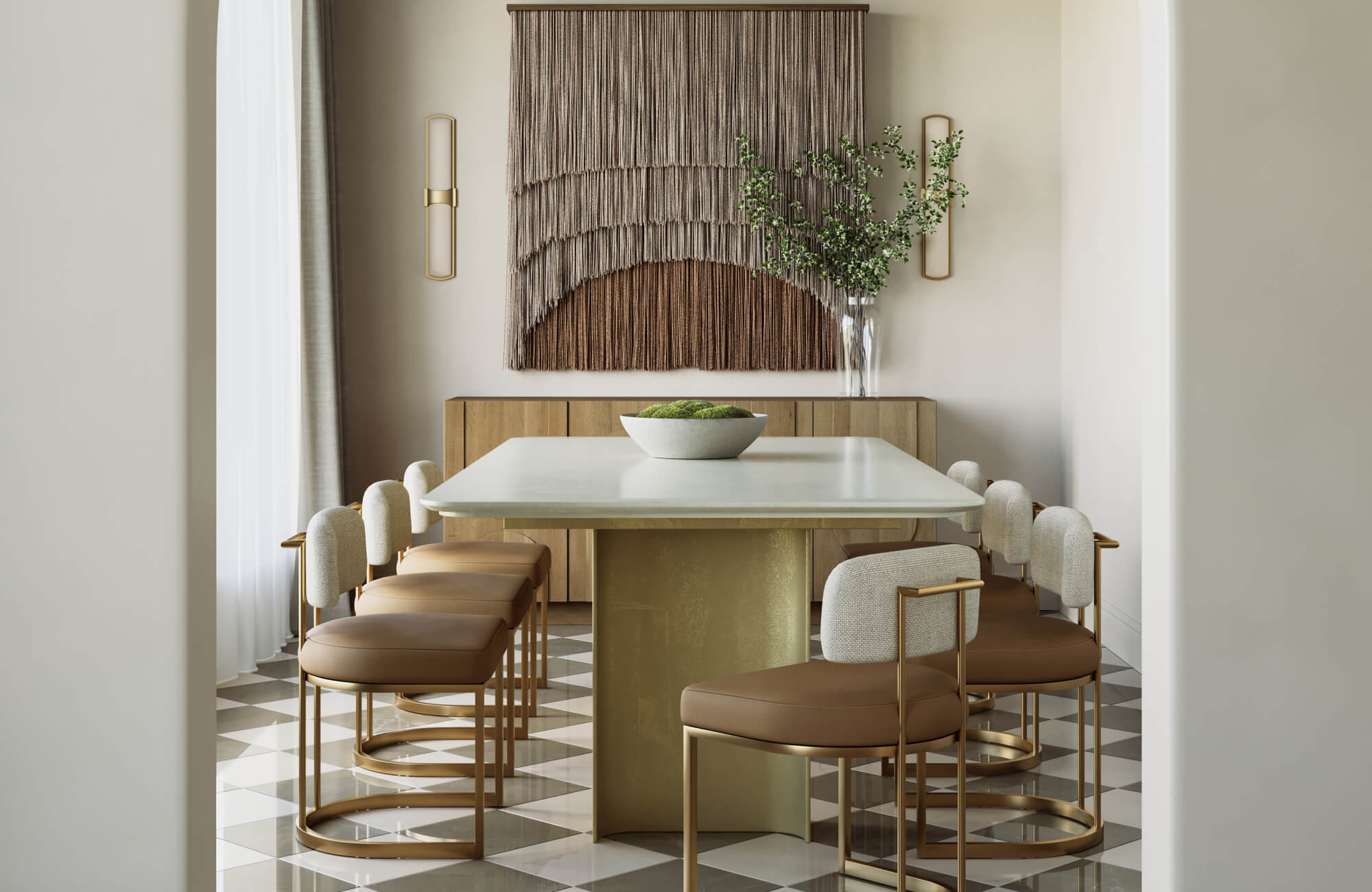 null An elegant dining room centered around a marble dining table with a soft, matte surface and sculptural base, complemented by upholstered chairs, warm brass accents, and layered neutral décor for a refined, contemporary feel.