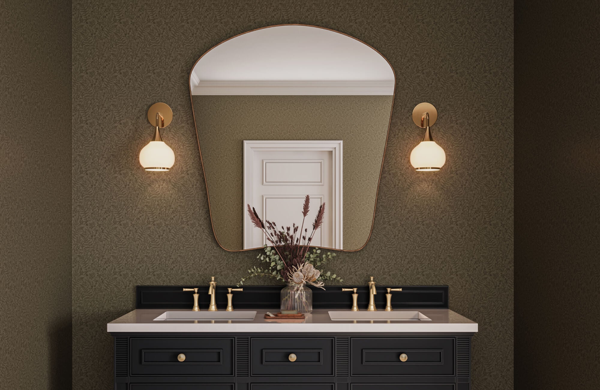 Textured botanical wallpaper behind a double vanity with brass fixtures, arched mirror, and warm wall sconces in an elegant bathroom.