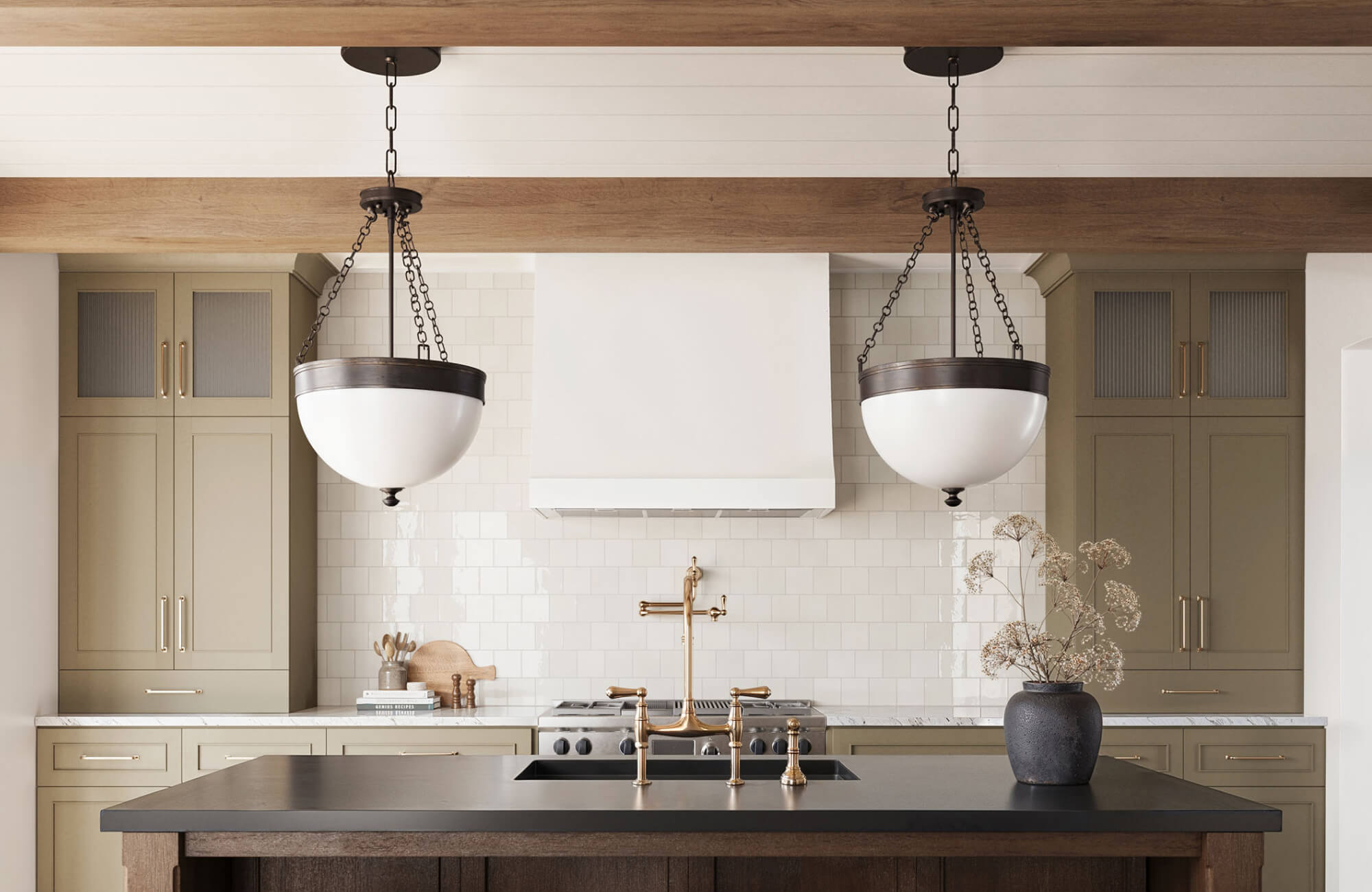 Oversized bowl pendants mounted to ceiling beams, casting strong downward light over a dark wood kitchen island.