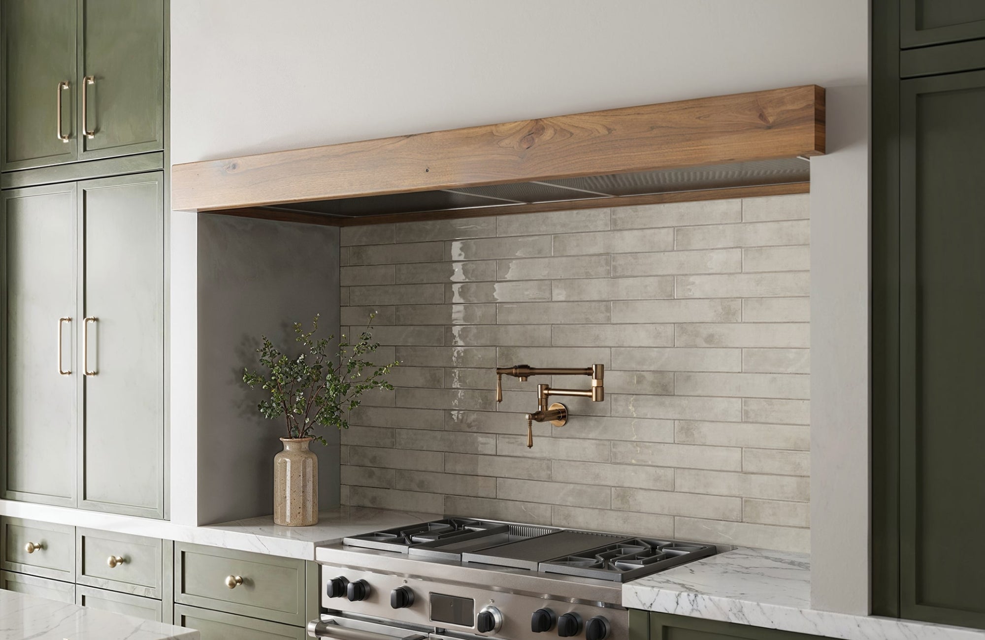 Glossy light gray rectangular tile backsplash reflects light and adds depth to the kitchen.