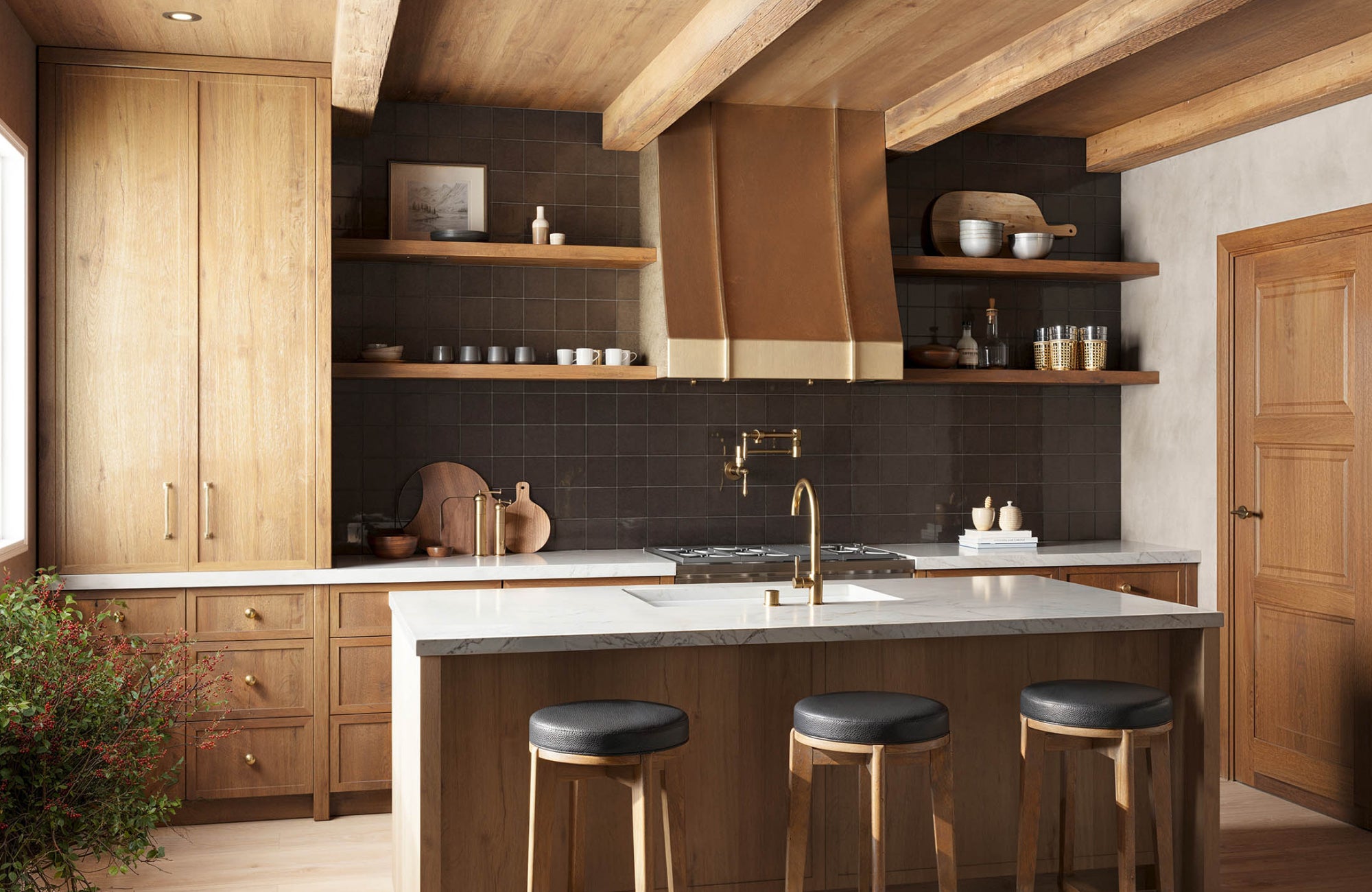 Dark espresso square backsplash tiles create a striking contrast with wood cabinets, adding bold drama to the space.