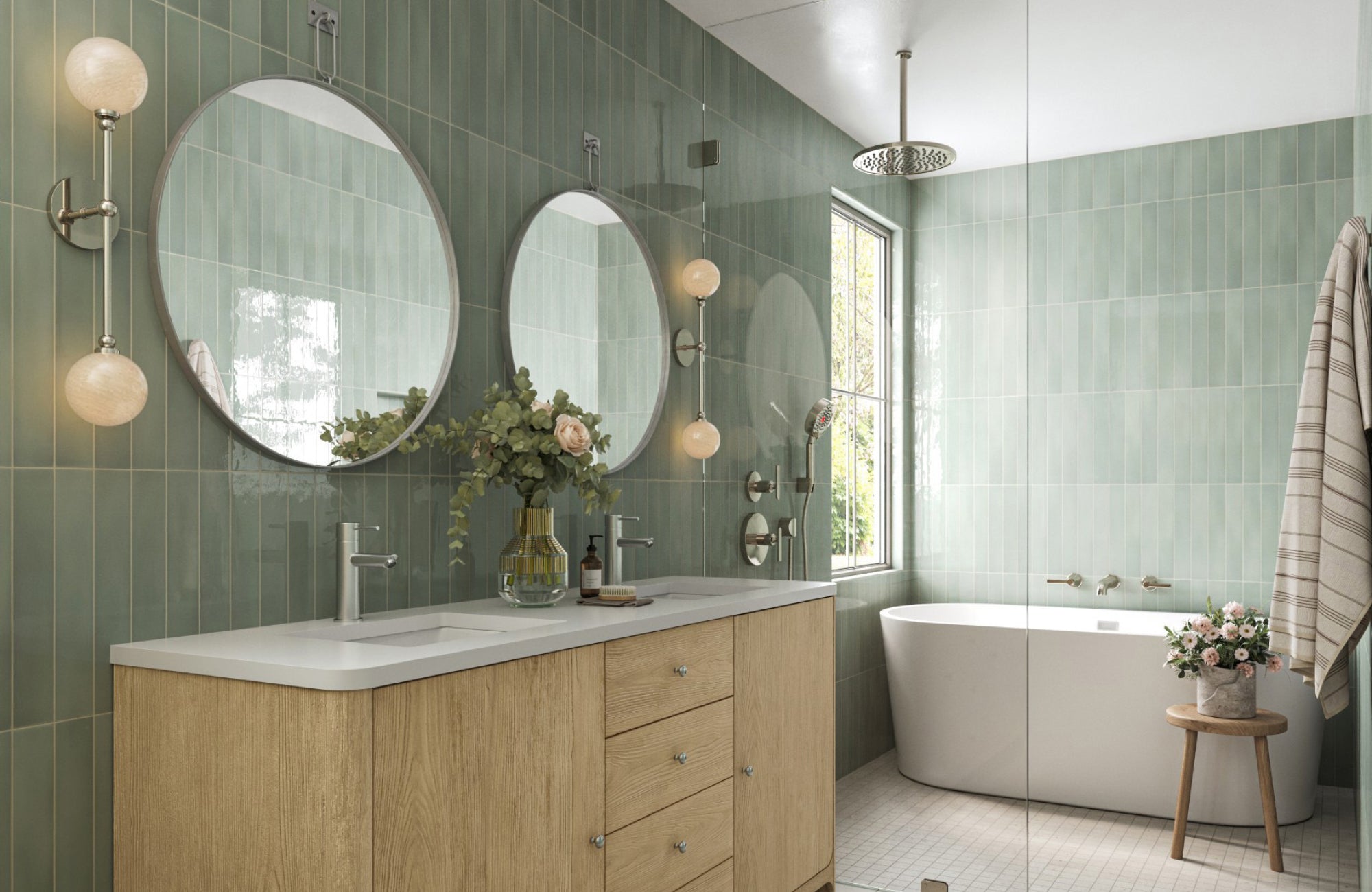 null Elegant double-globe wall lights complement round mirrors and green tile walls in a bright bathroom retreat.