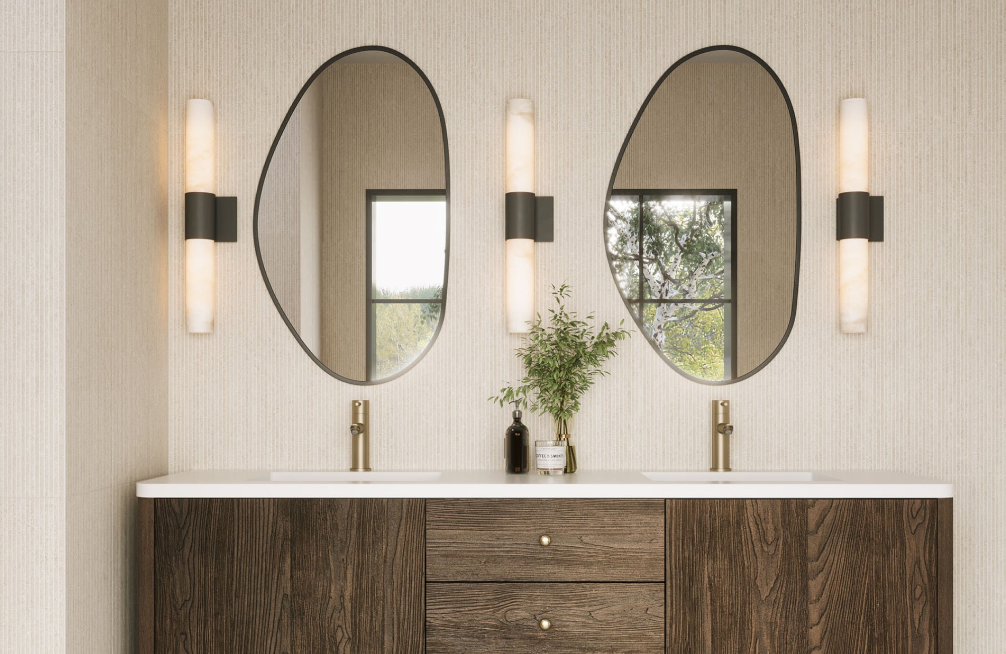 null Vertical alabaster sconces deliver diffuse, ambient light between asymmetric mirrors over a wood vanity.