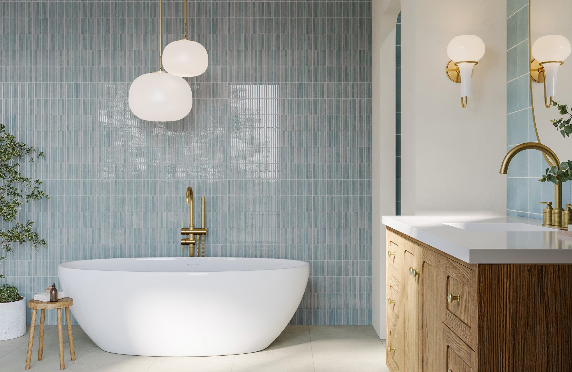 null Oversized pendant lights add sculptural interest and warm accent lighting above a compact green vanity nook.