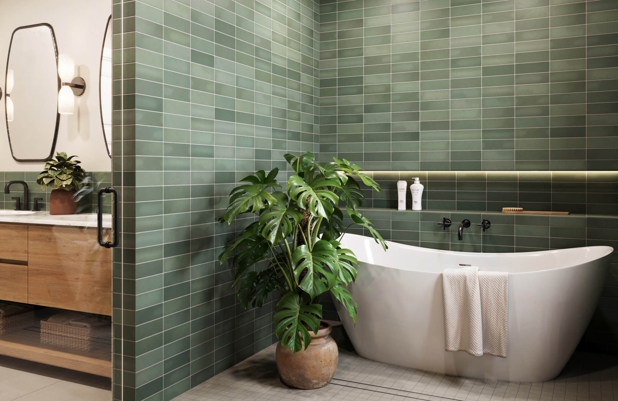 null A spa-like bathroom with deep green subway tiles, a white freestanding tub, and warm wood accents, complemented by lush greenery.