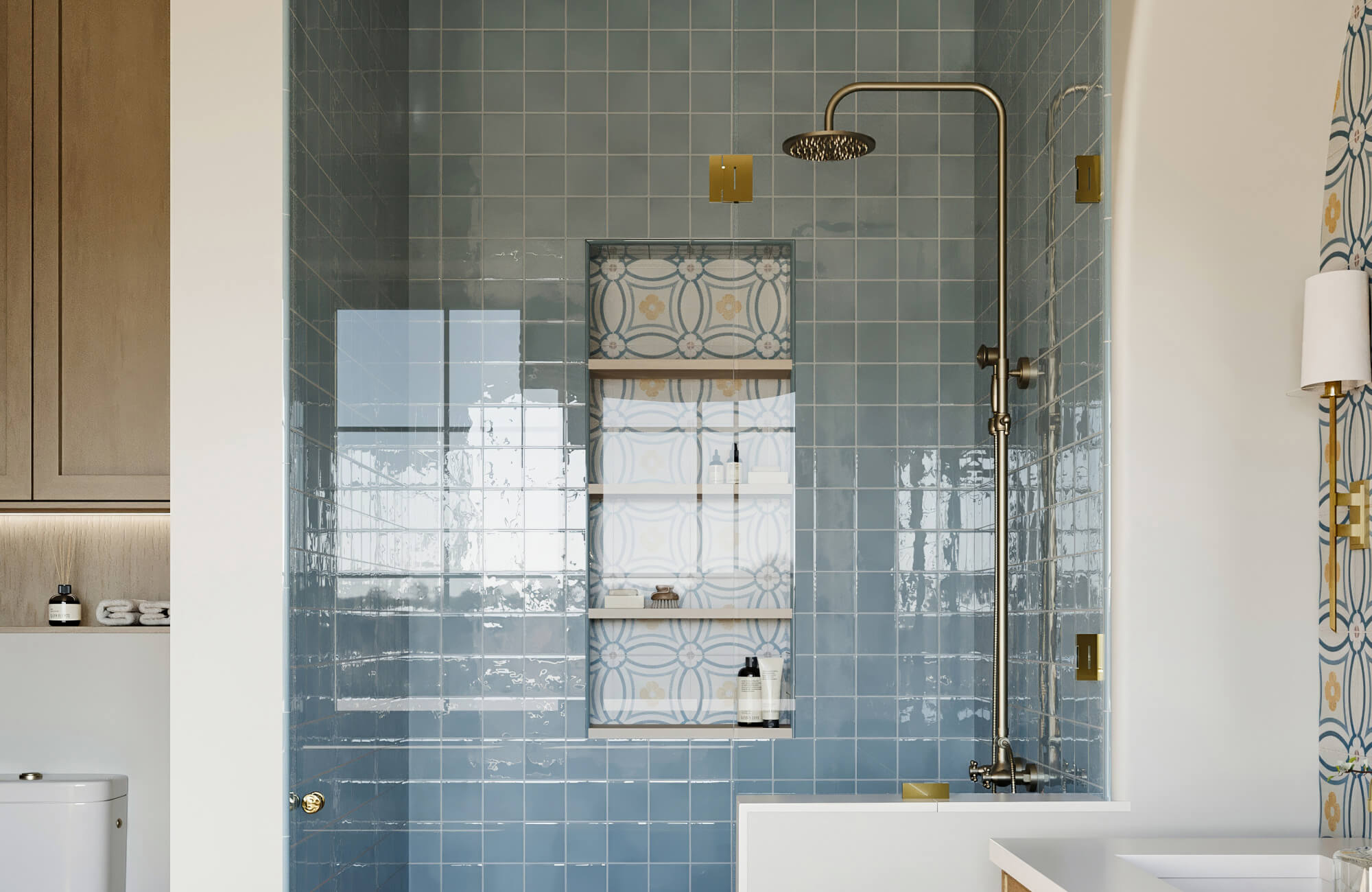 null Glossy light blue square ceramic tiles with brass fixtures and floral accent tile create a charming, vintage-inspired shower design