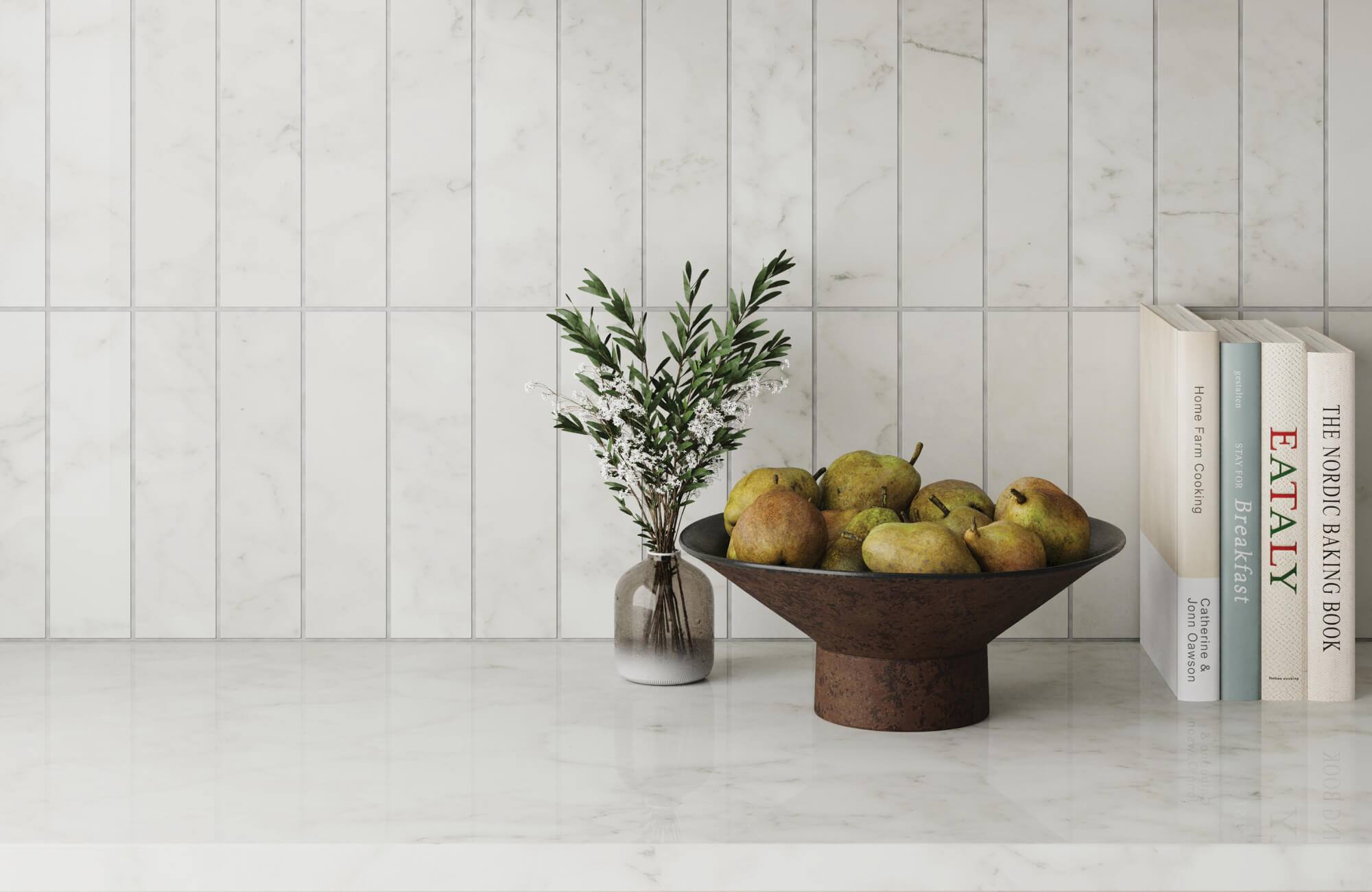 White marble-look subway tiles paired with pale grey grout create a refined and airy backsplash, perfect for warm kitchens.