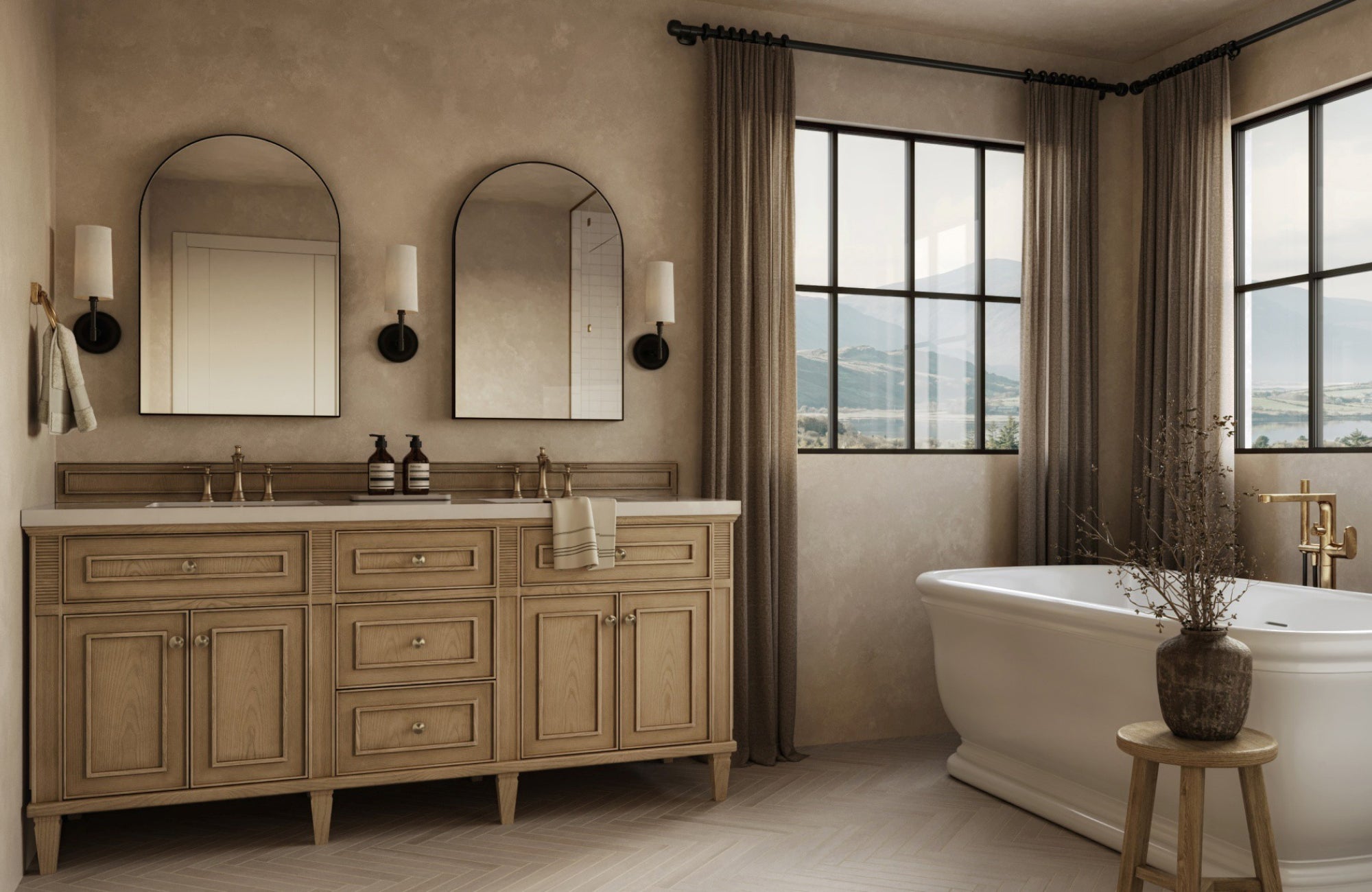 null Cylindrical wall sconces with white fabric shades complement black backplates between twin mirrors in a beige-toned bathroom.