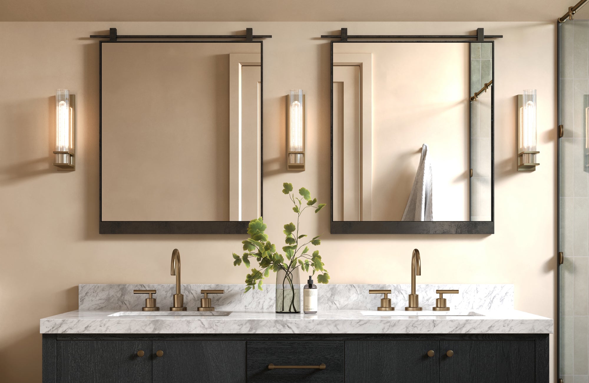 null Square black-framed dual mirrors over a double sink vanity with brass accents and wall sconces for symmetry