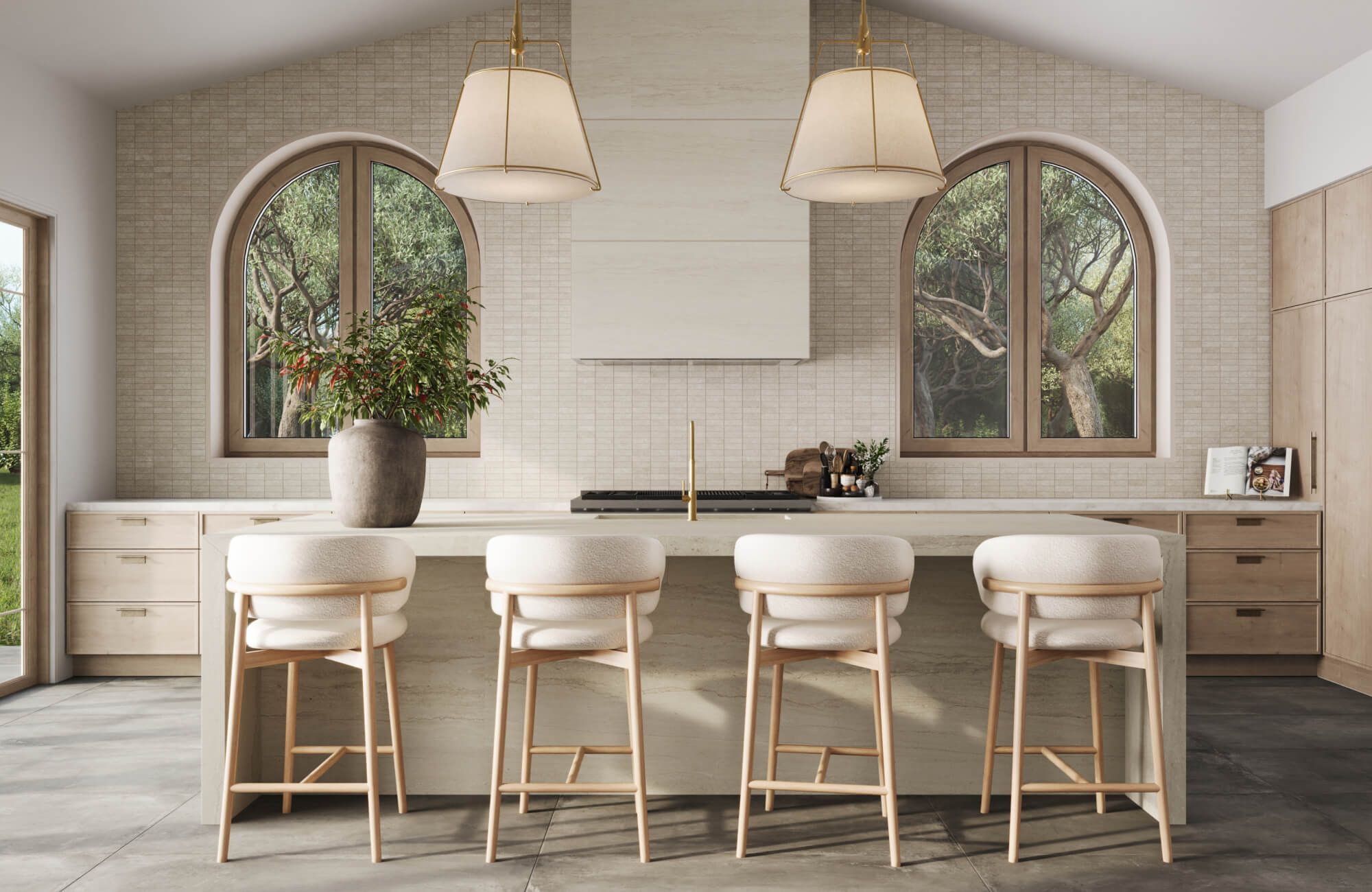 Warm neutral kitchen with cream vertical tile backsplash, arched windows, and white island seating under modern pendant lights.