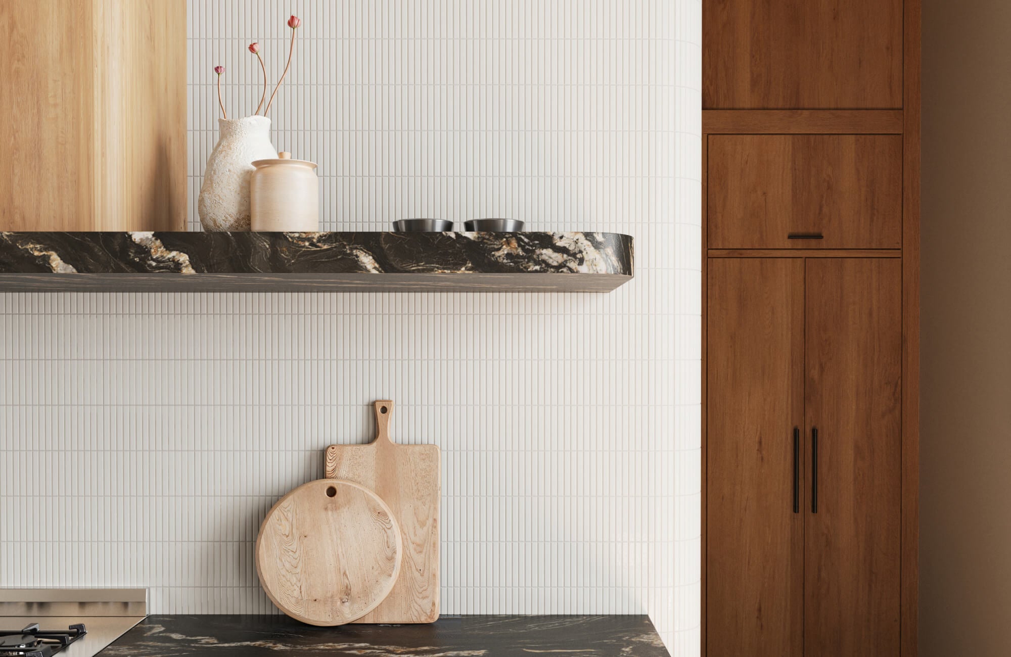 Warm kitchen with white vertical backsplash tiles, dramatic veined stone shelf, and natural wood cabinetry.