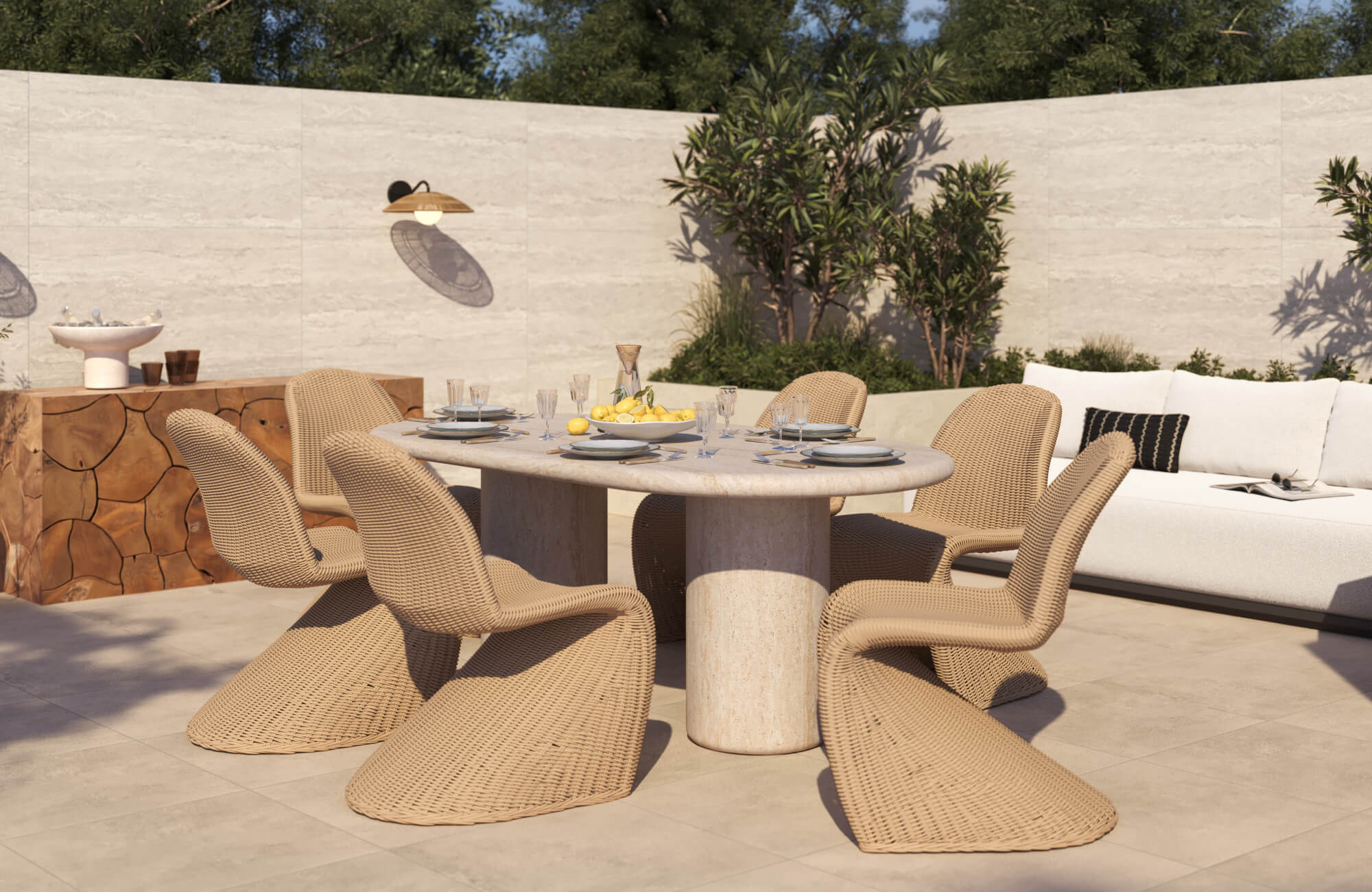 null Modern outdoor dining patio with beige woven chairs, cream stone table, white cushioned sofa, and warm wood sideboard.