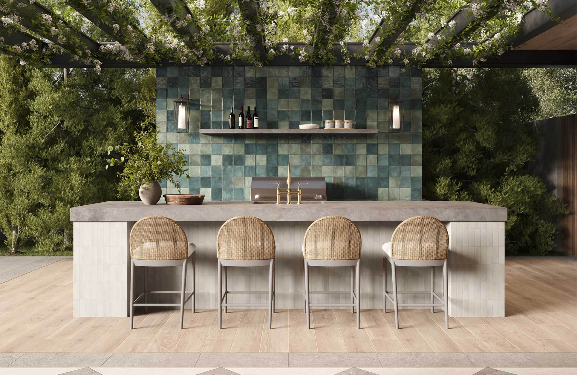 null Contemporary outdoor kitchen with green square tile backsplash, gray stone counter, light wood stools with woven seats, and pergola greenery.