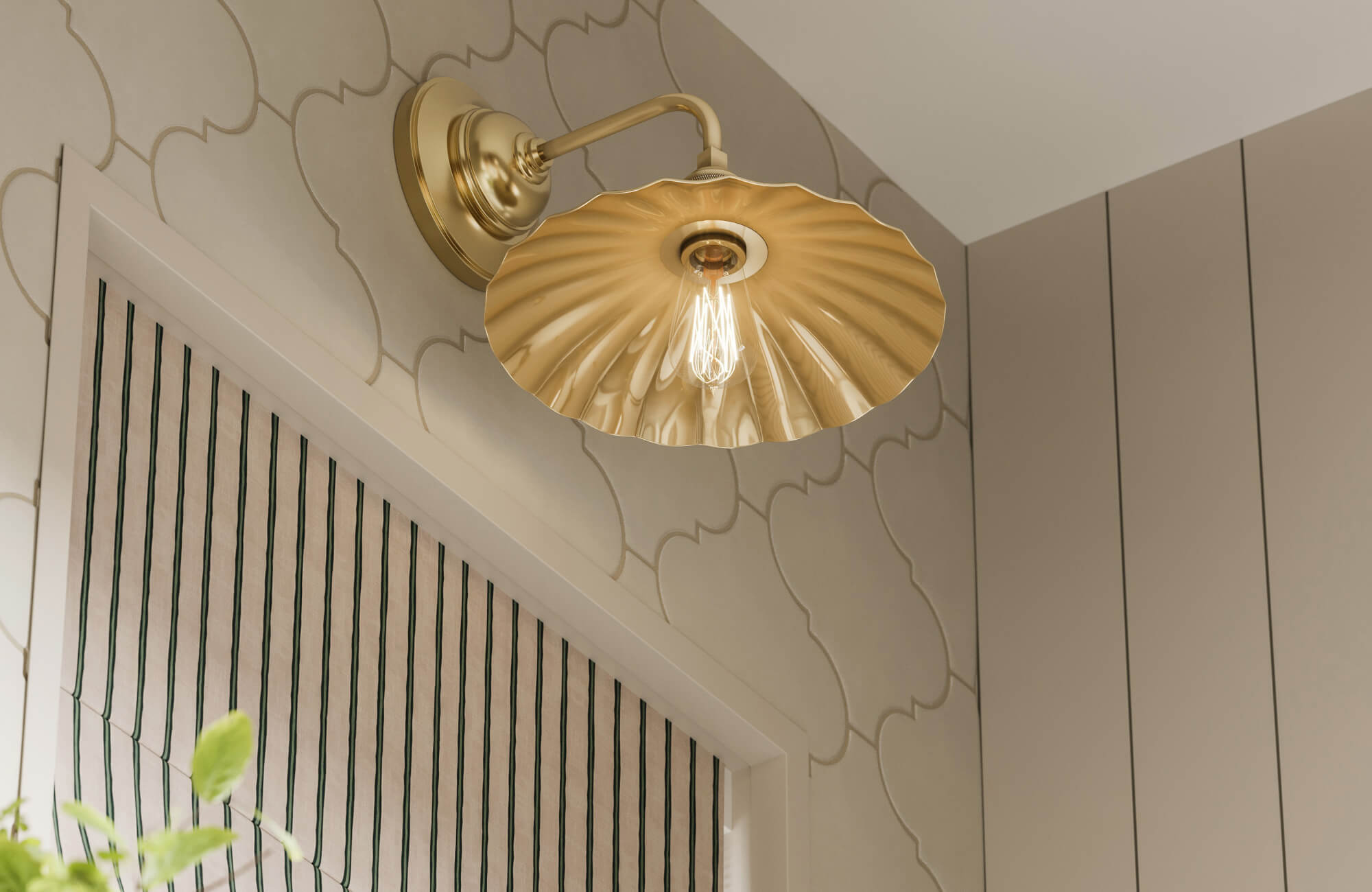 null Close-up of the Miriam Wall Sconce in Aged Brass, featuring a scalloped shade and a vintage bulb that adds warmth and elegance to the space.