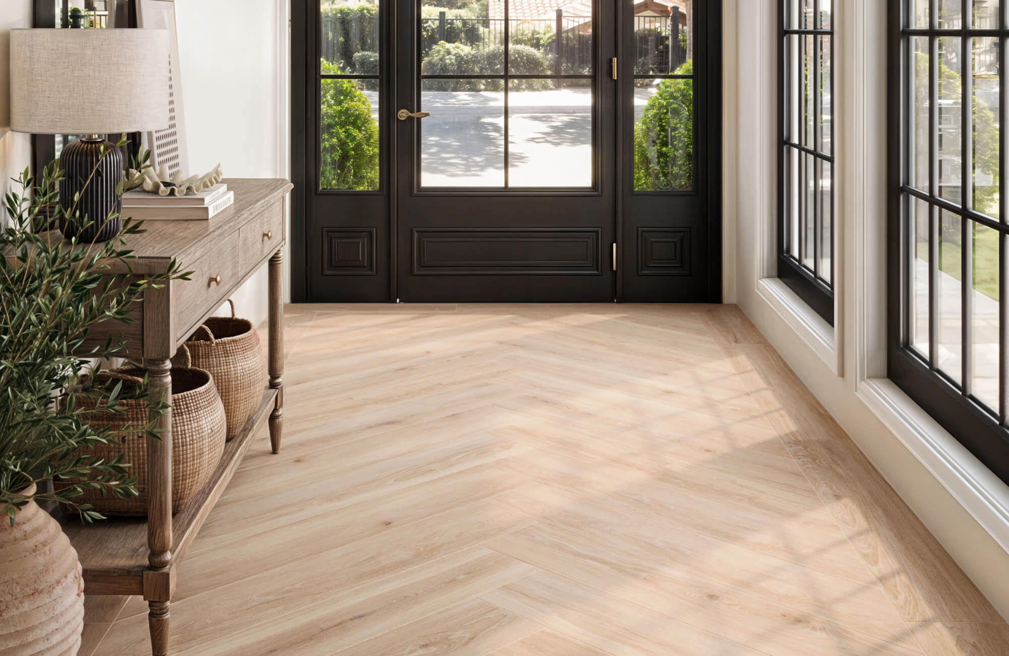 null Blonde wood-look tiles enhance a modern kitchen with soft natural light, warm wooden cabinetry, and minimalist decor.