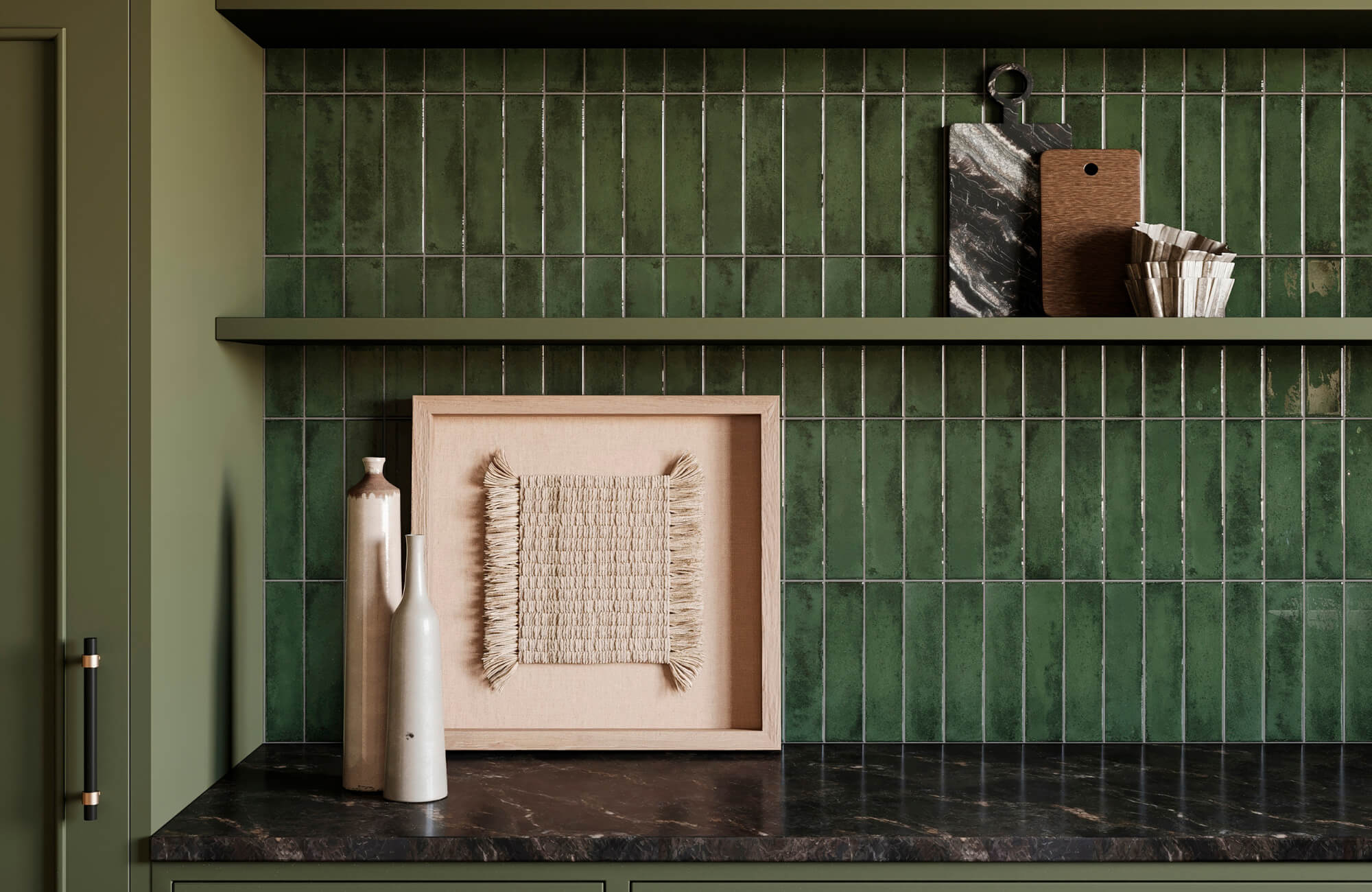 null Kitchen shelf with green tile backsplash, framed textile art, ceramics, and wood accents showcasing layered textures and natural materials.