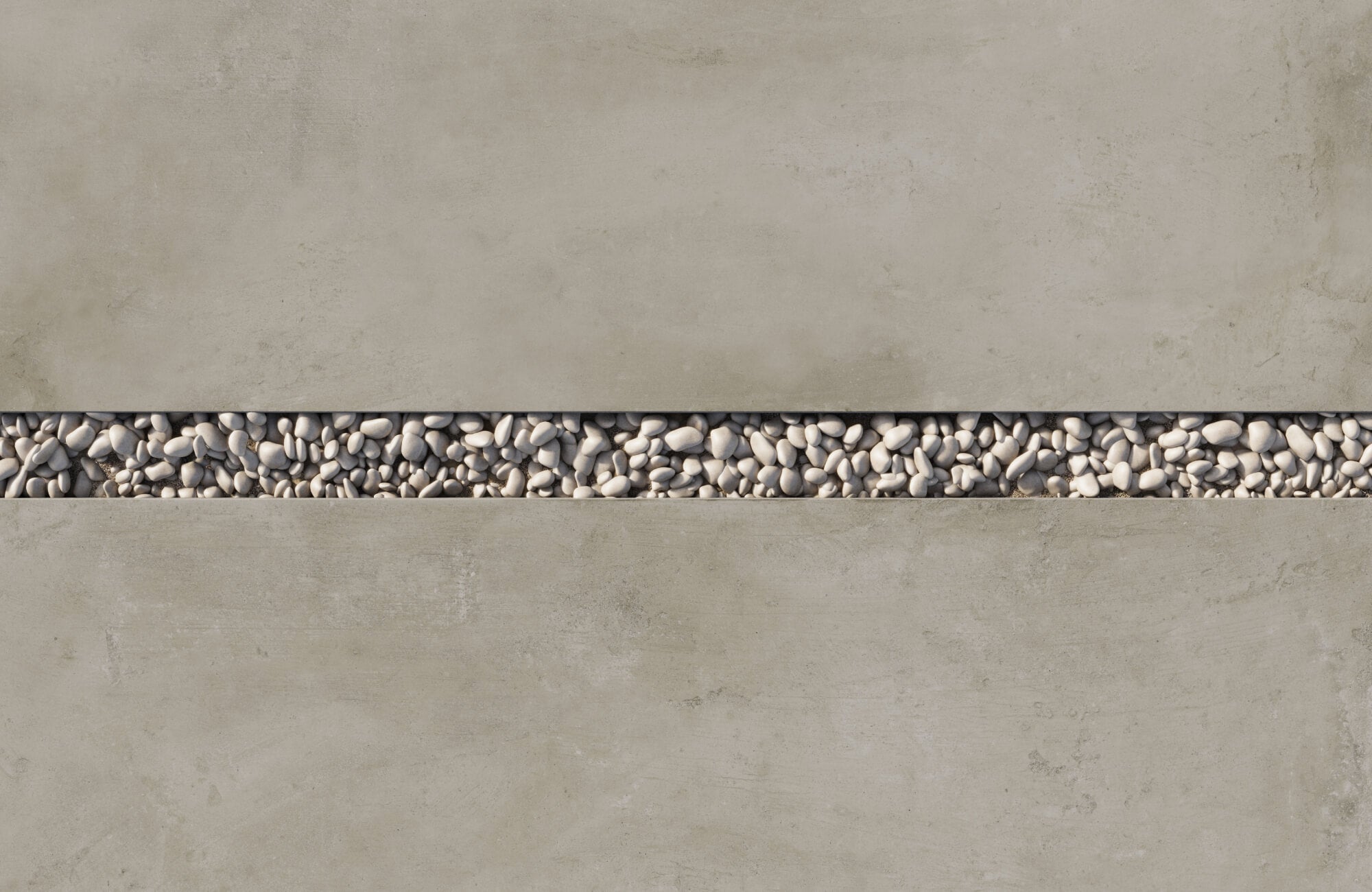 null Modern porcelain concrete-look tiles separated by a sleek strip of smooth river pebbles for a refined, organic contrast.