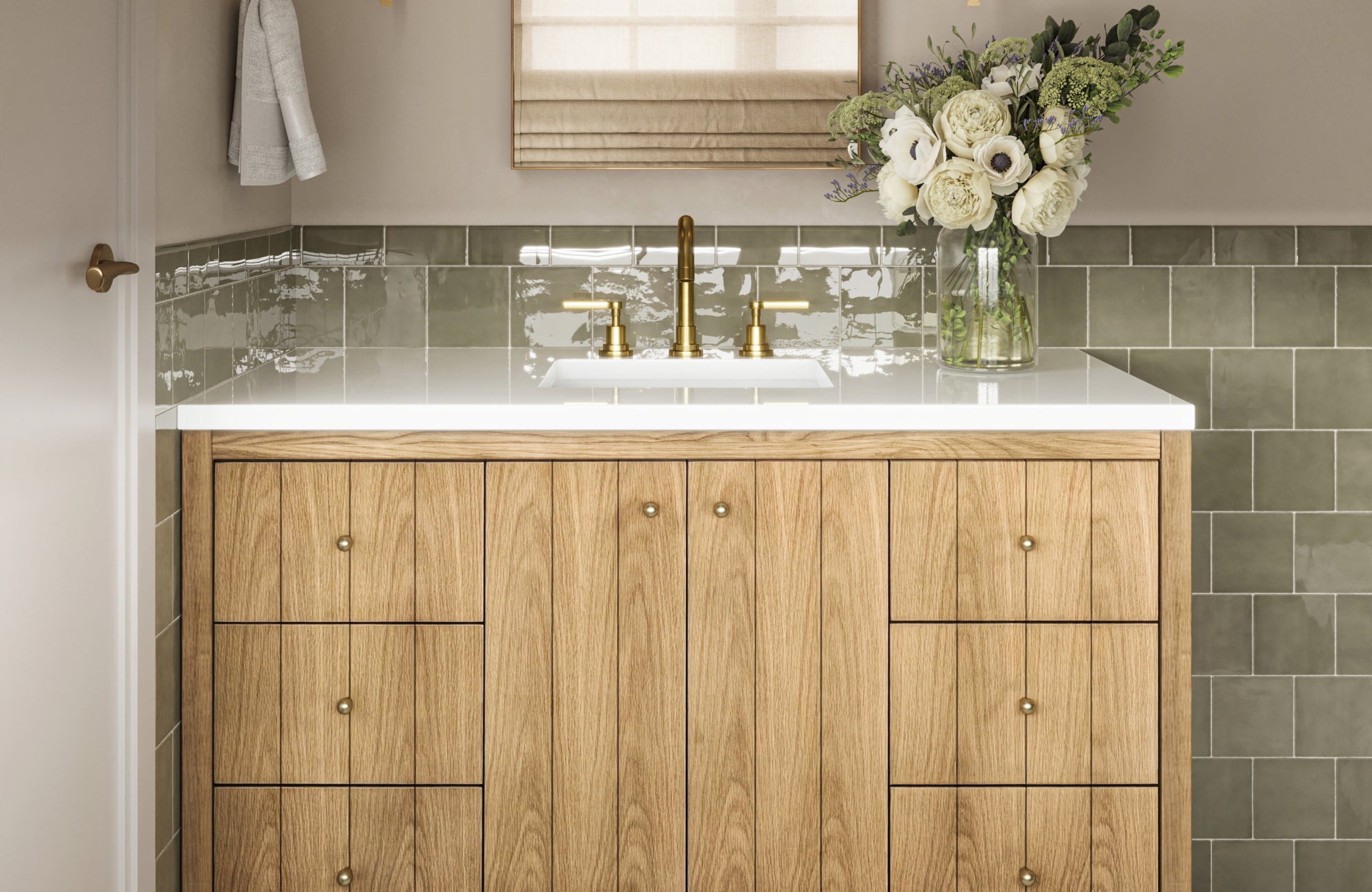 Mid-sized natural wood vanity with clean lines, white quartz top, and floral arrangement in a guest bathroom.
