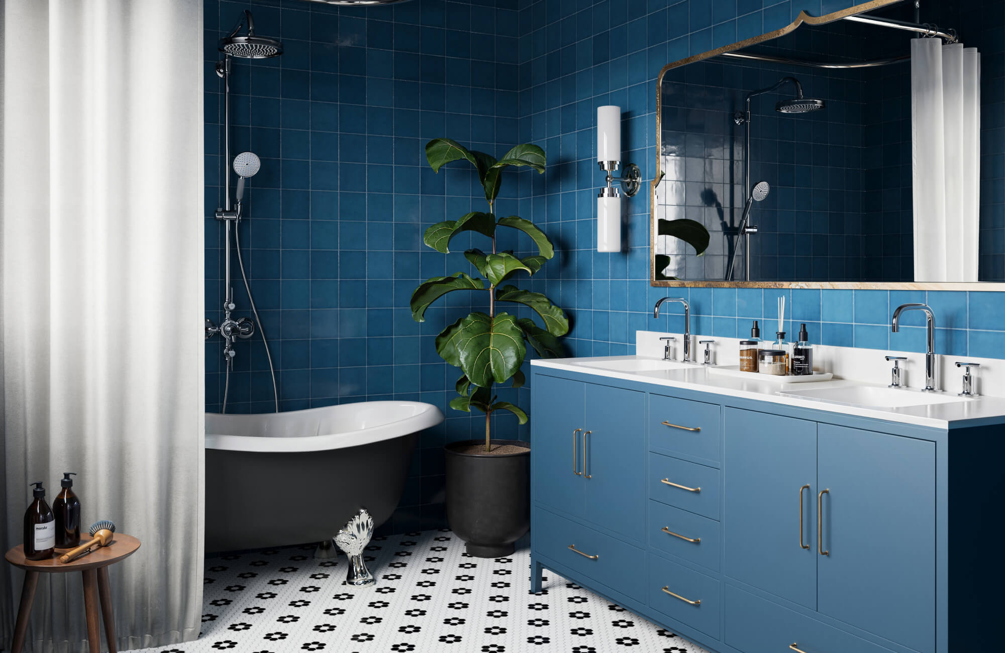 Blue tile bathroom with matching vanity, gold hardware, freestanding tub, patterned floor tiles, and large plant for a refreshing look.