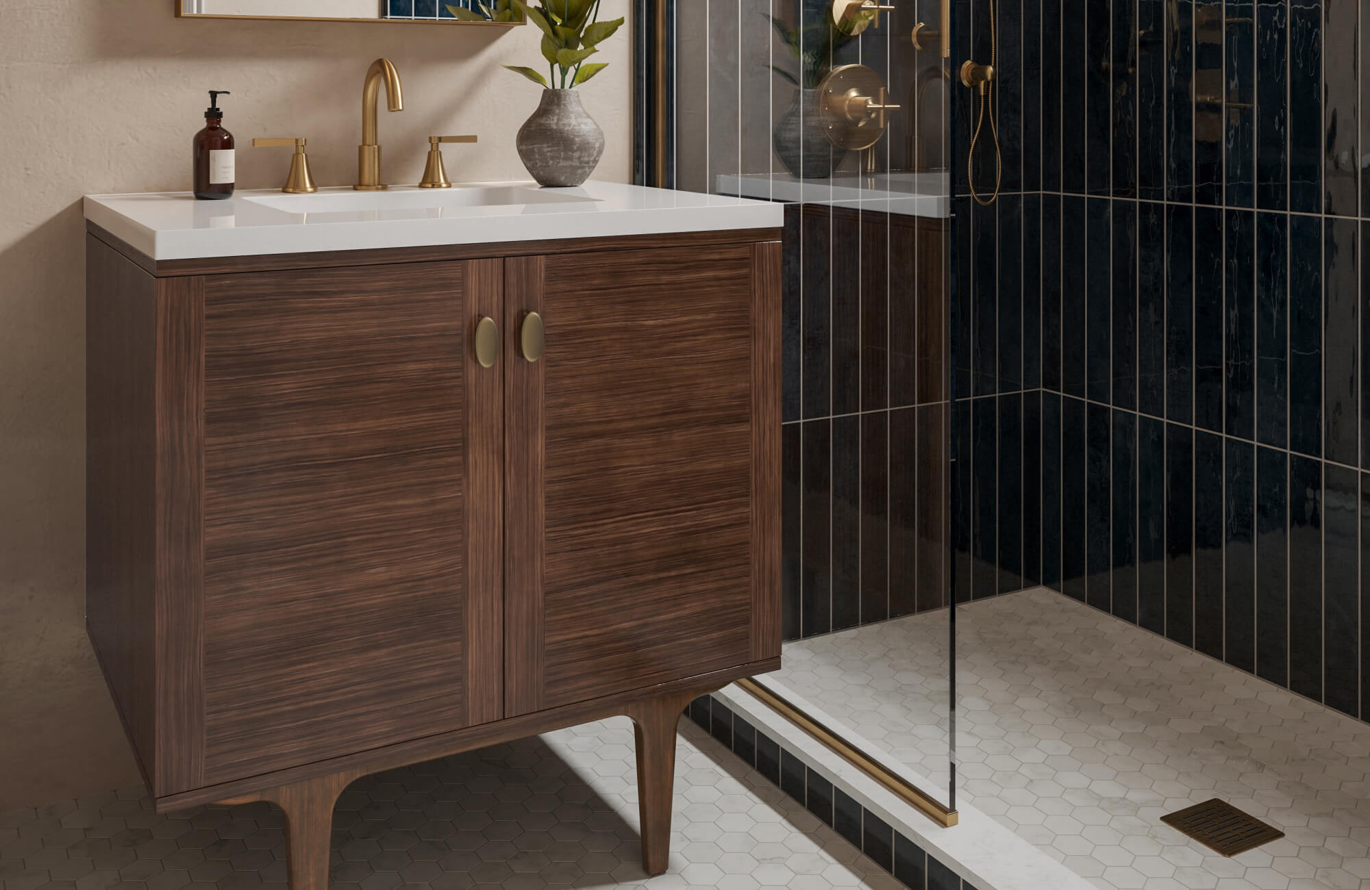 Modern bathroom featuring a rich walnut vanity with brass fixtures and dark vertical shower tiles showcasing a timeless vanity color choice