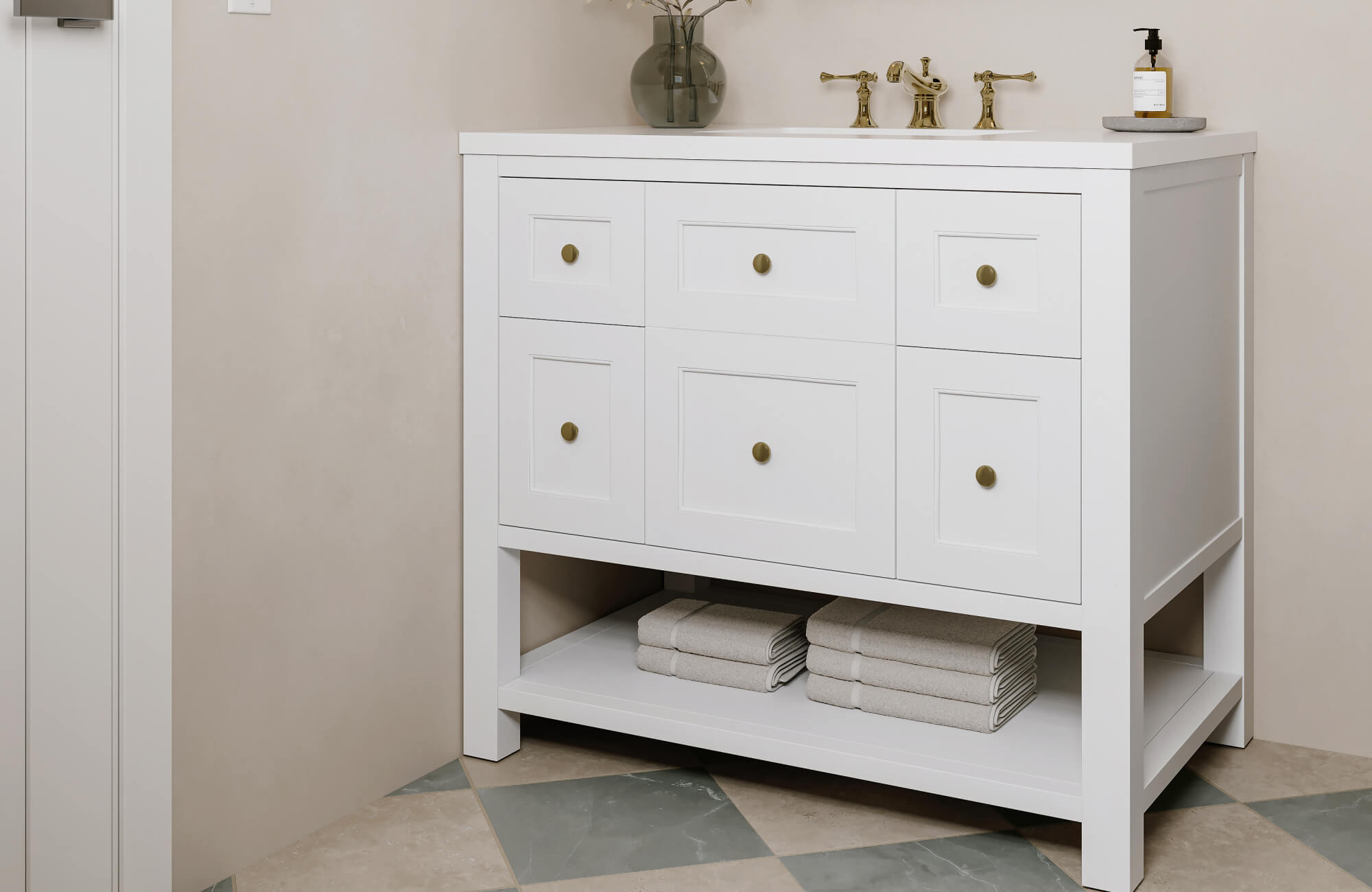 Bathroom featuring a crisp white shaker vanity with brass hardware and diamond-patterned tile floor highlighting timeless vanity style
