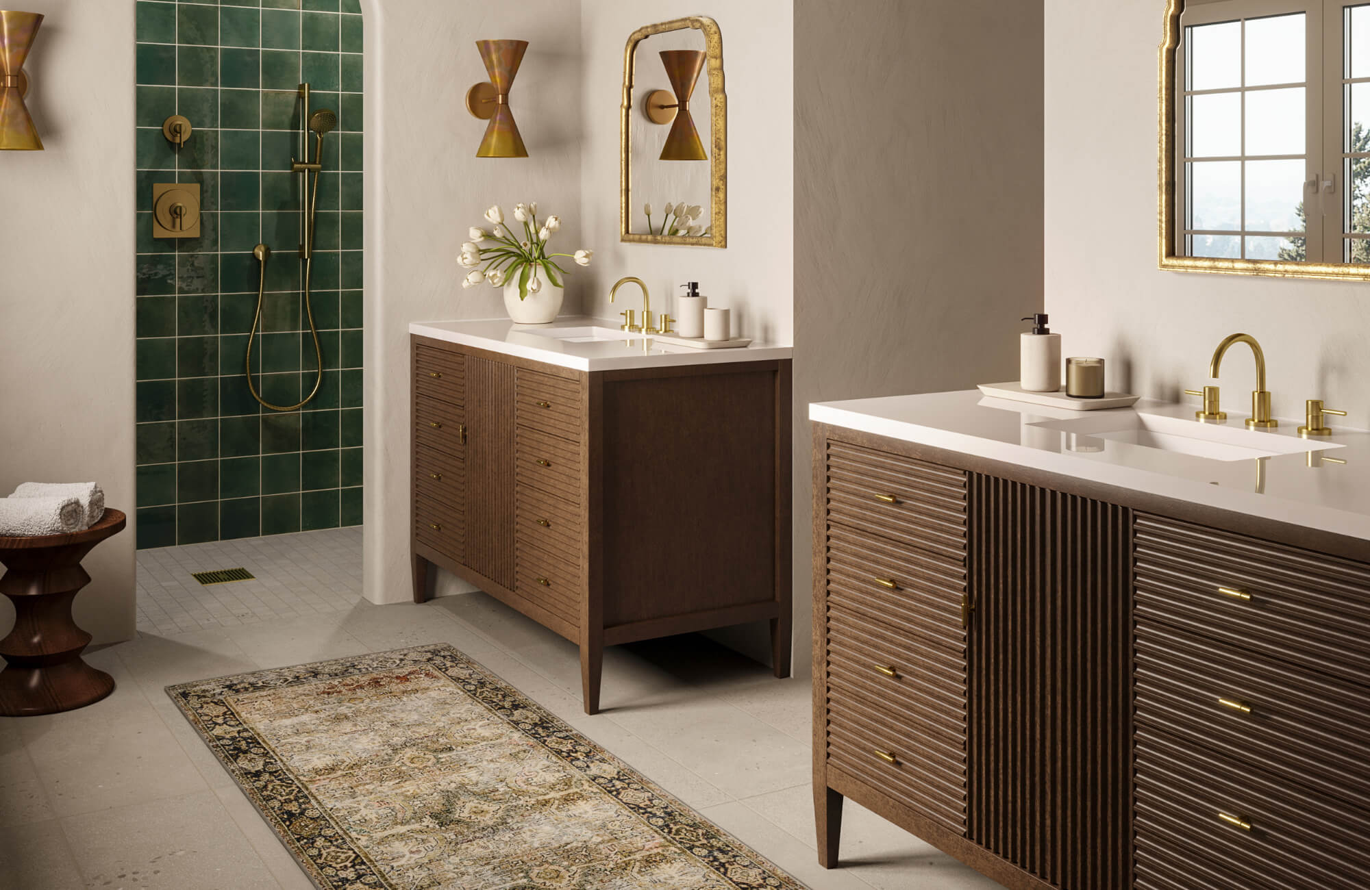 null Pair of modern wood vanities with brass fixtures in a bathroom featuring green tiled shower walls and soft neutral finishes.