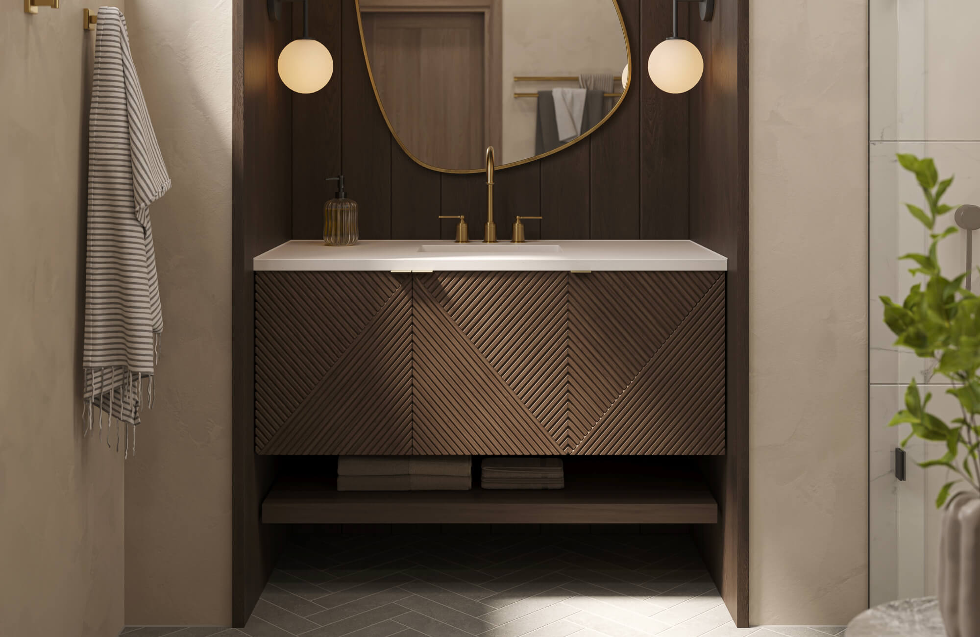null Compact bathroom vanity with dark wood chevron-front cabinet, white countertop, brass faucet, round mirror, and globe wall sconces.