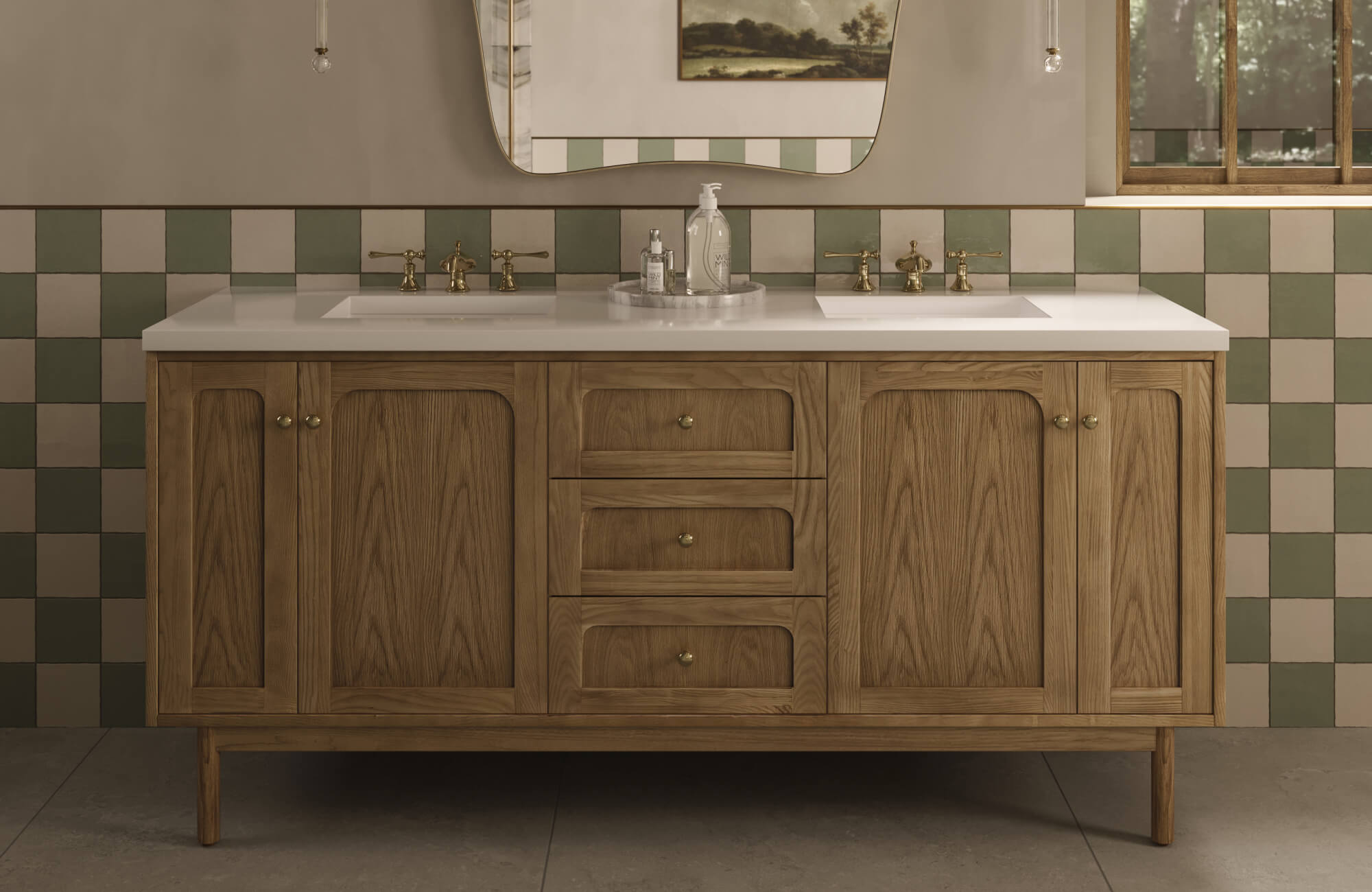 null Charming double-sink vanity with warm oak cabinetry, brass fixtures, and a sage and cream checkerboard tile backsplash.