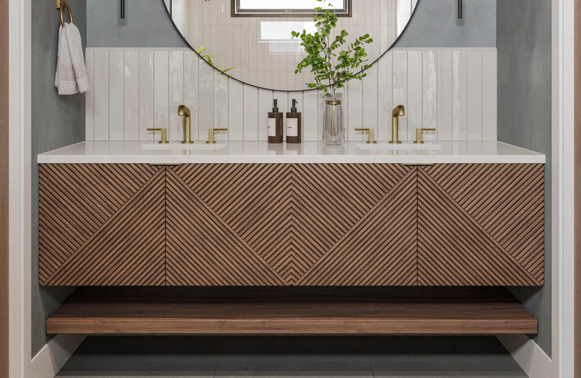 null Glossy vertical white tile backsplash complements a chevron wood vanity with brass fixtures and a sleek floating design.