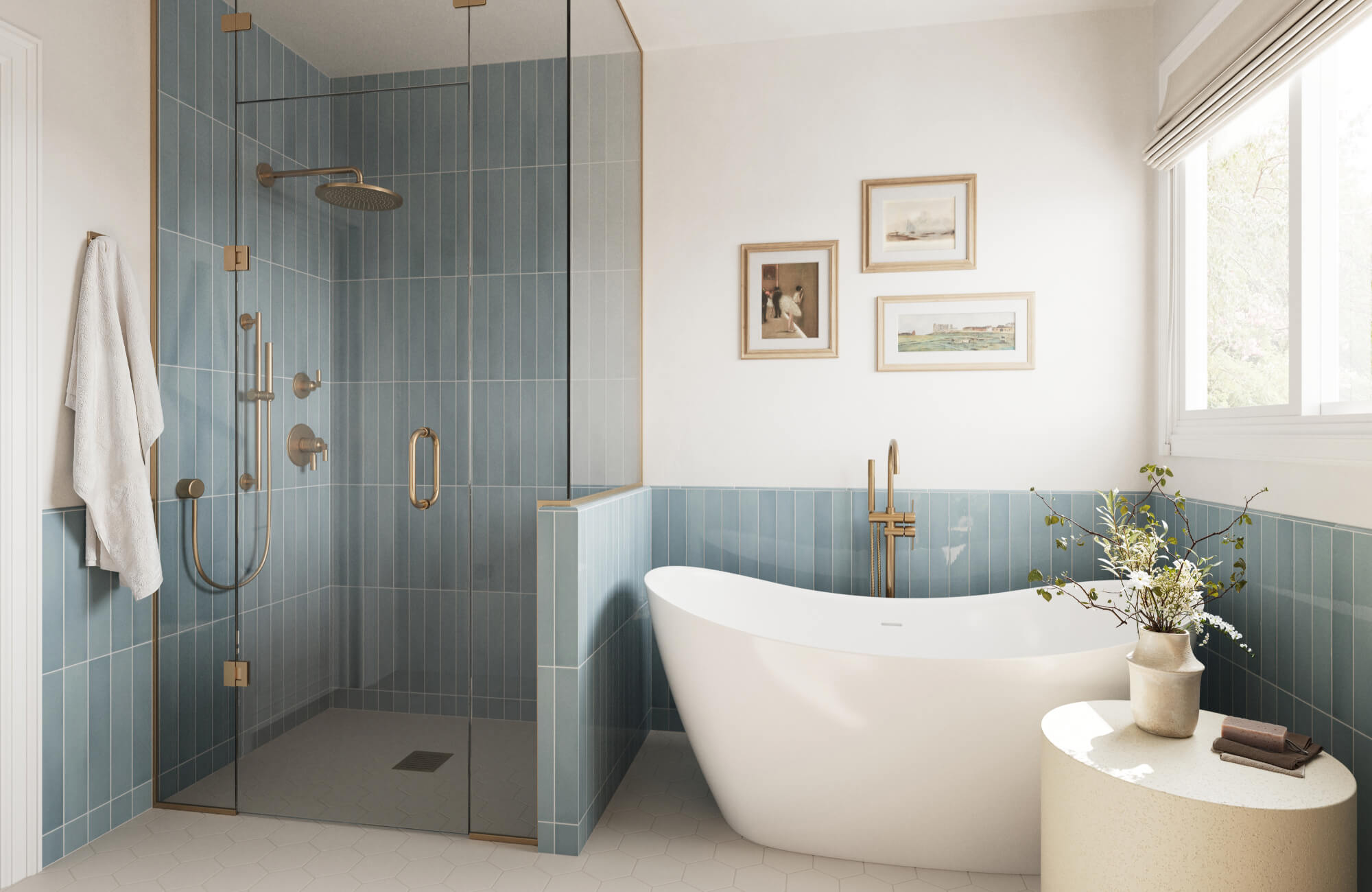 null Light blue tiles line the shower and lower walls of this bathroom, pairing beautifully with a white soaking tub and brass hardware.